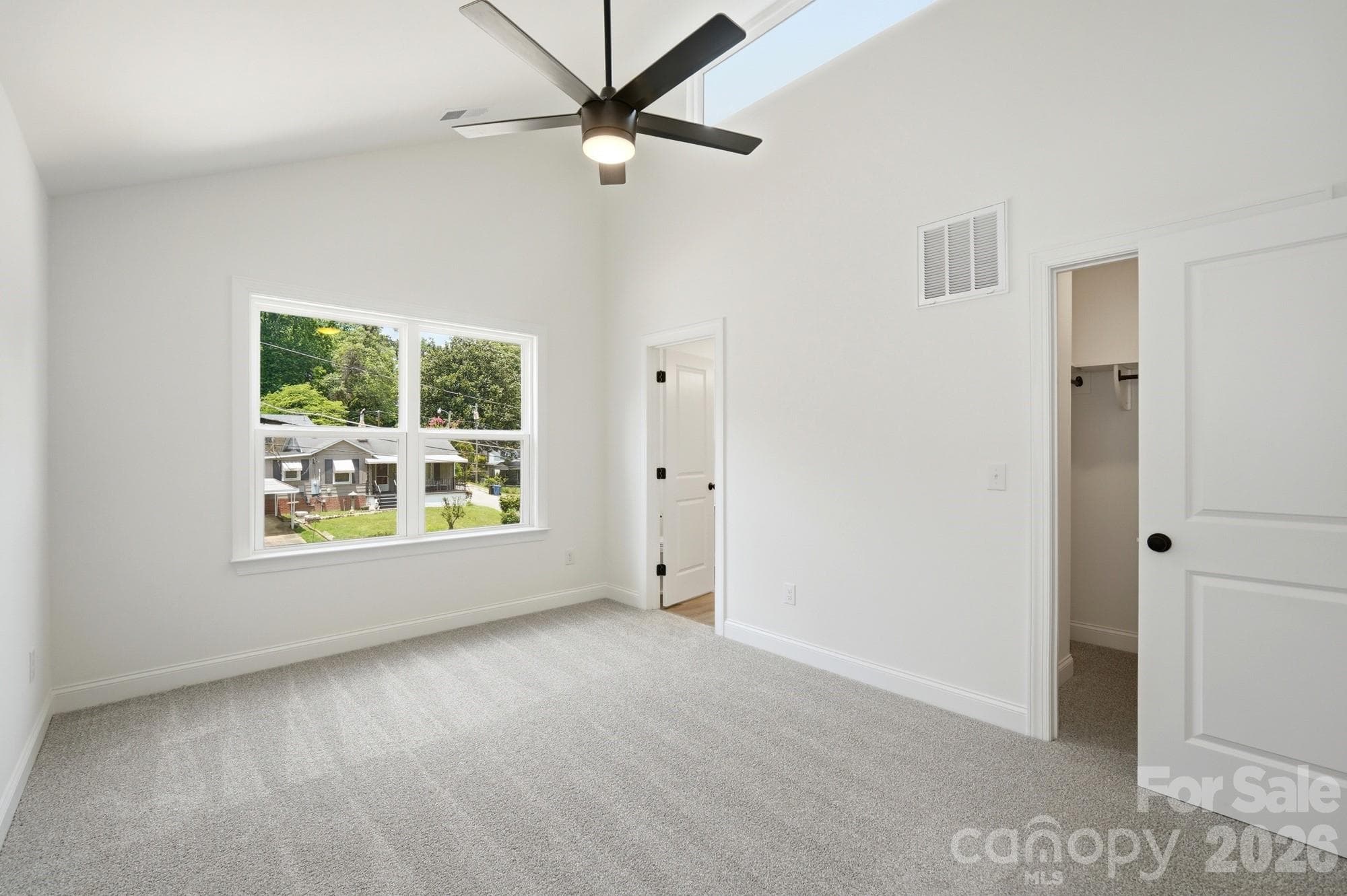 View of Primary Bedroom with Vaulted Ceilings - 116 7th Avenue SE, Hickory