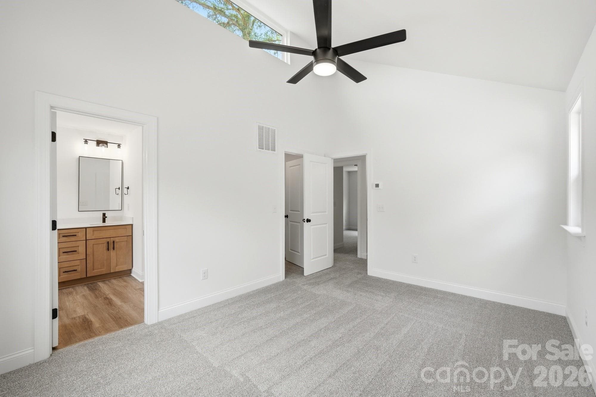 Additional View of Primary Bedroom Looking into the Ensuite Bathroom - 116 7th Avenue SE, Hickory