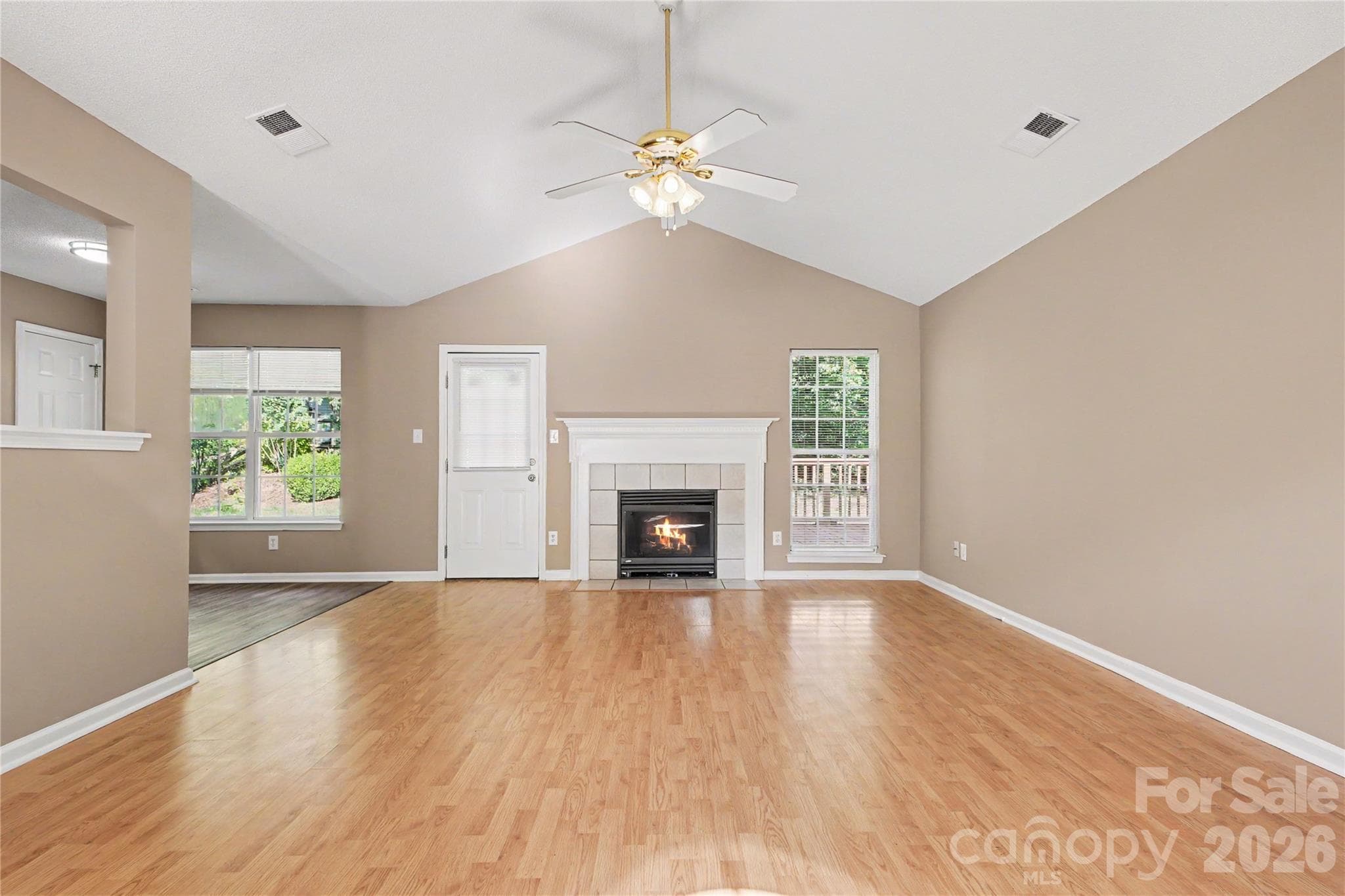 Living room  vaulted ceiling fireplace - 3786 Sedgewick Street SW, Concord
