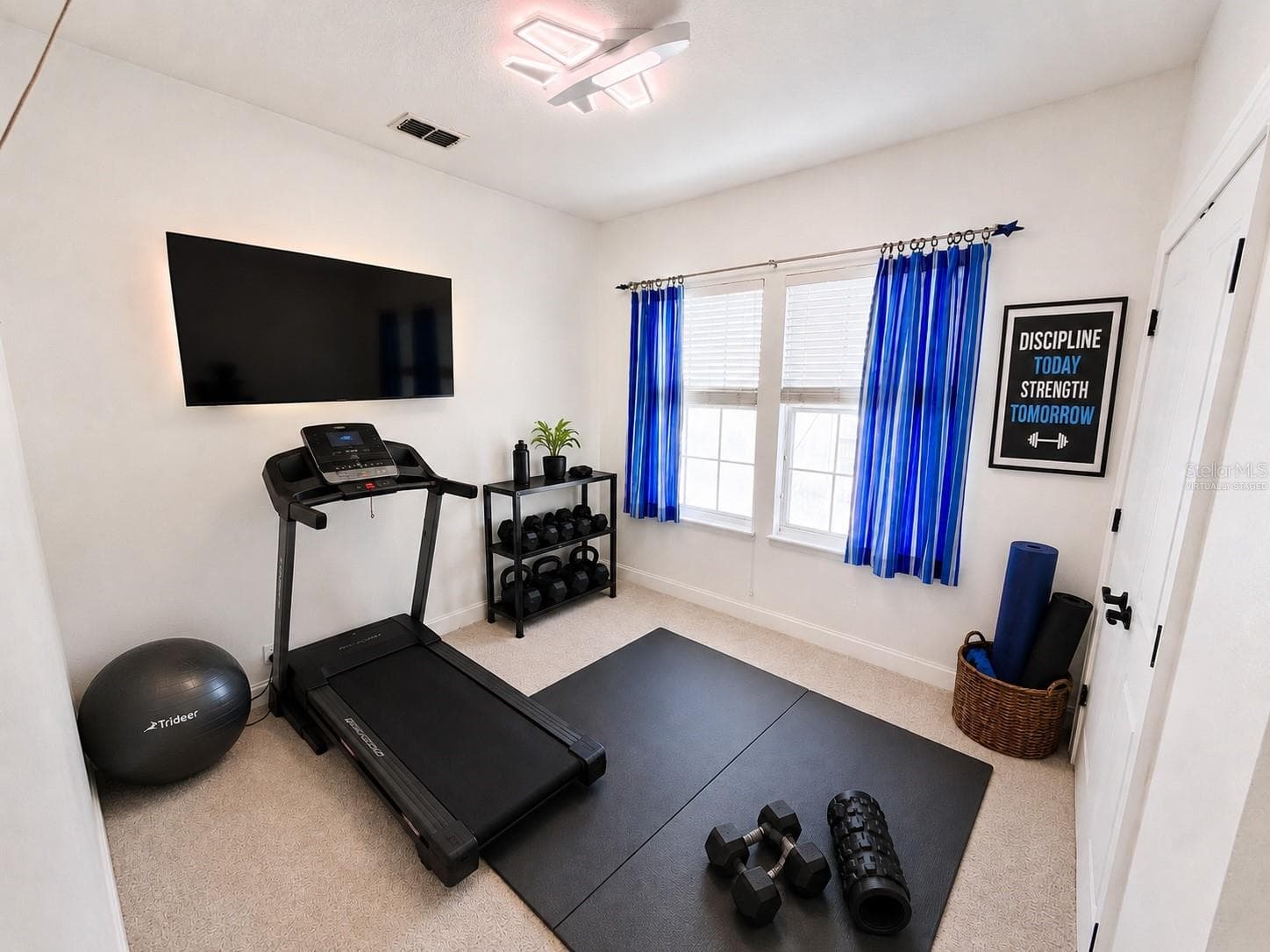 Fourth bedroom upstairs (virtually staged as gym - has closet) - 807 OAK SHADOWS RD, CELEBRATION