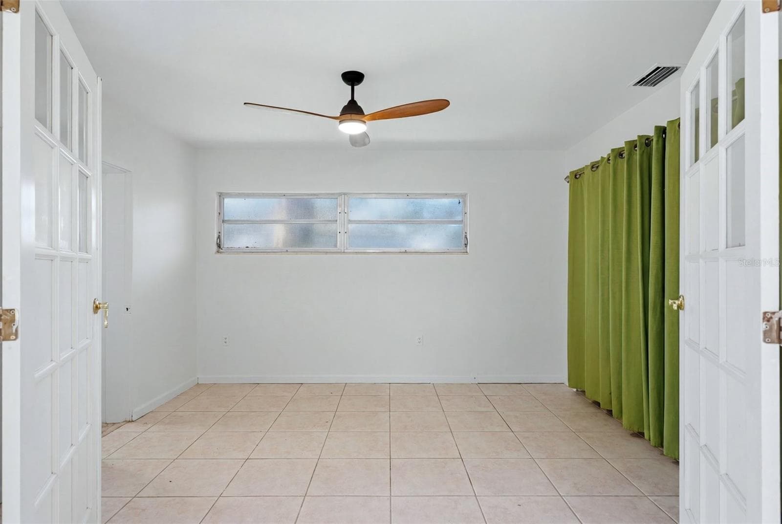 Primary bed room with double door entry - 4003 BOOTH PL, SARASOTA