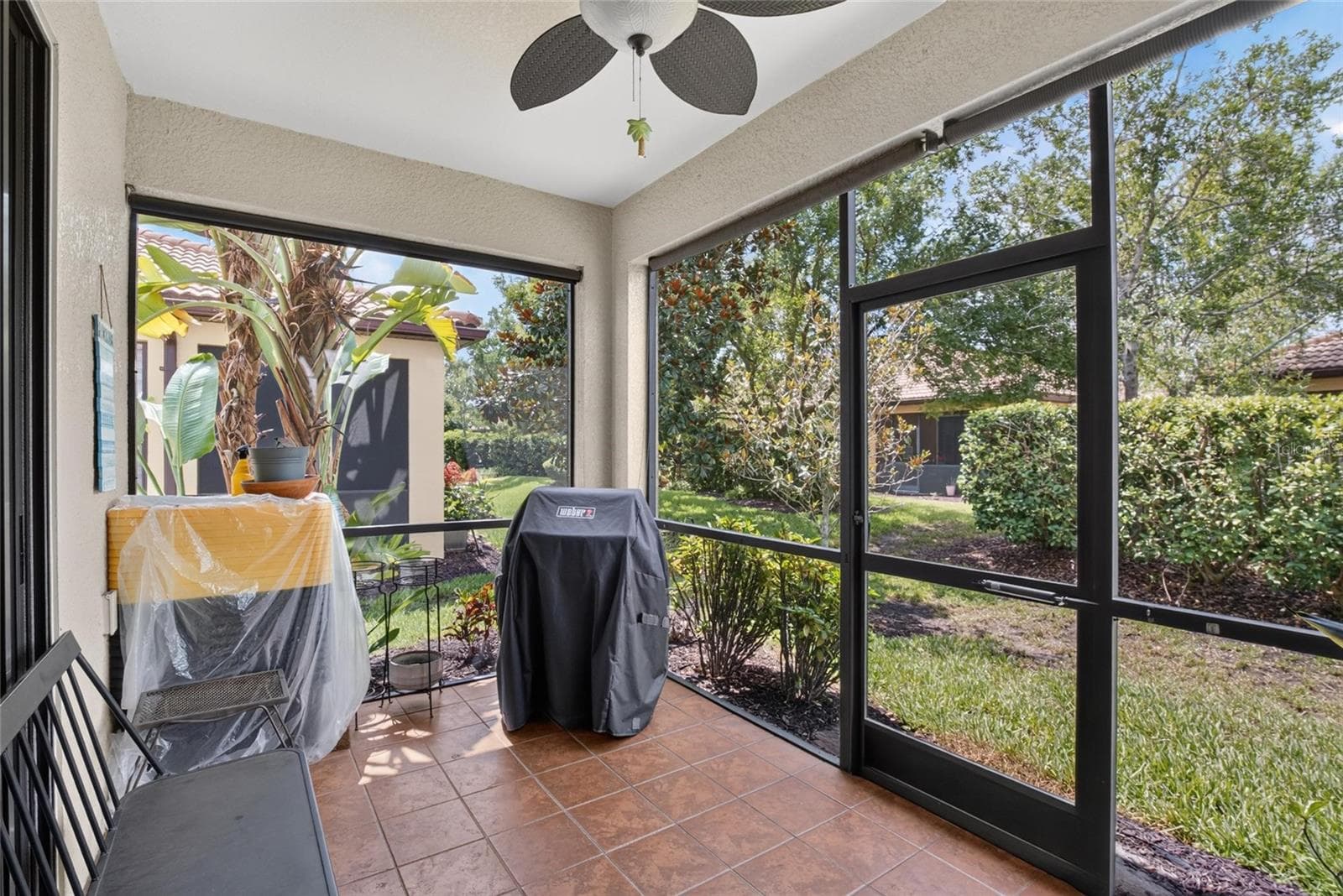 Tiled lanai - 342 BLUEWATER FALLS CT, APOLLO BEACH