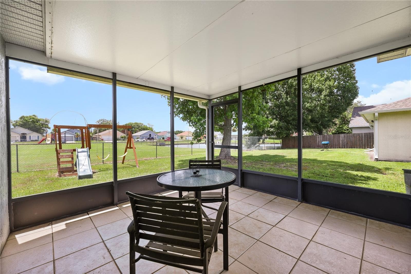 Covered porch - 2965 COOL BREEZE CIR, ST CLOUD