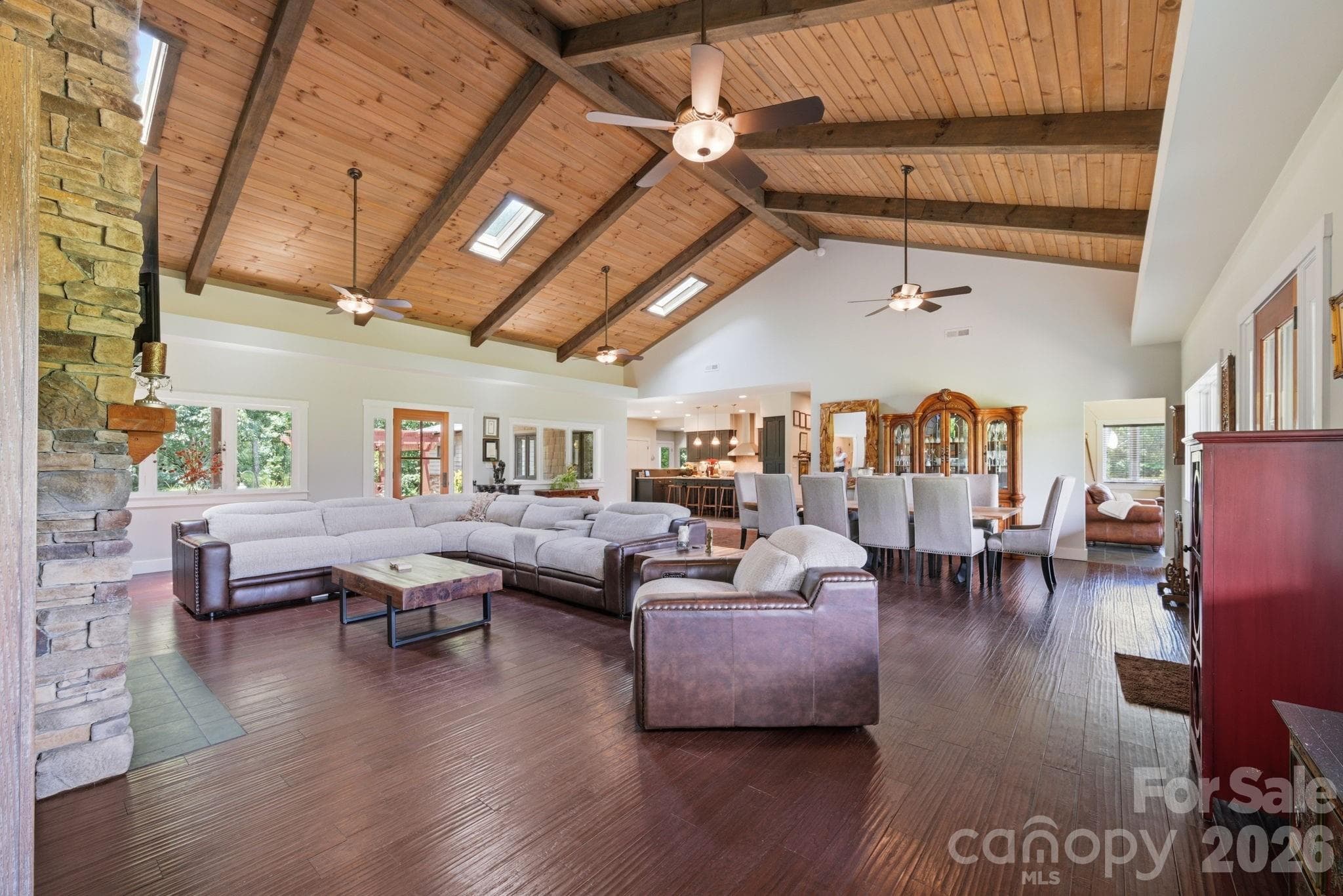 Open floor plan, engineered hardwood floors and tongue & groove vaulted ceilings - Lancaster