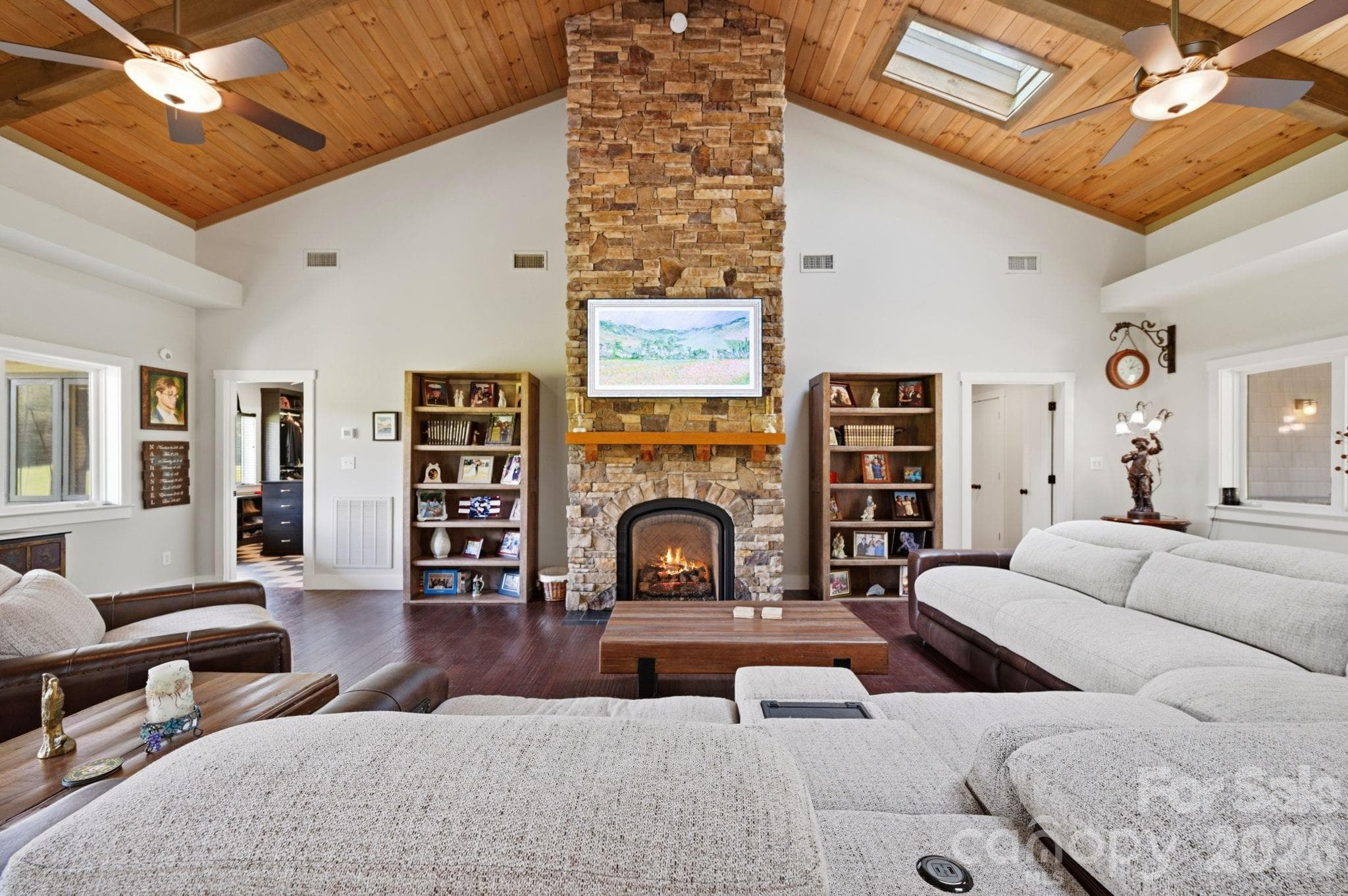 Floor to ceiling gas rock fireplace is the focal point on the home - Lancaster