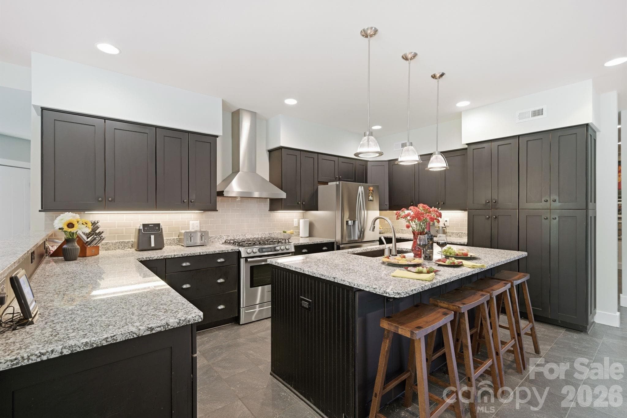 Kitchen offers granite countertops, custom cabinetry - Lancaster