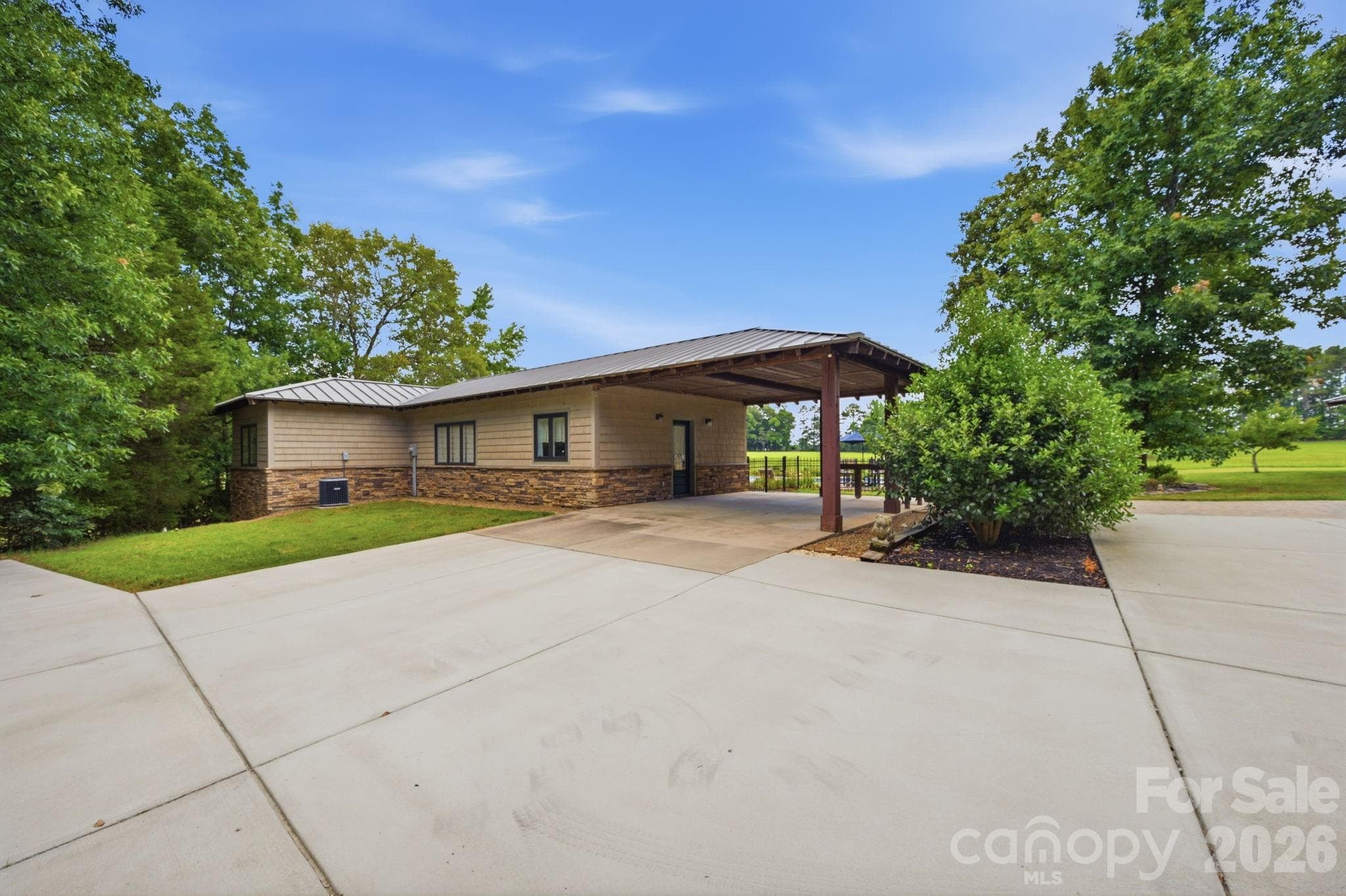 Plenty of concrete parking areas between the pool house and home, additional covered parking at the pool/guest house - Lancaster