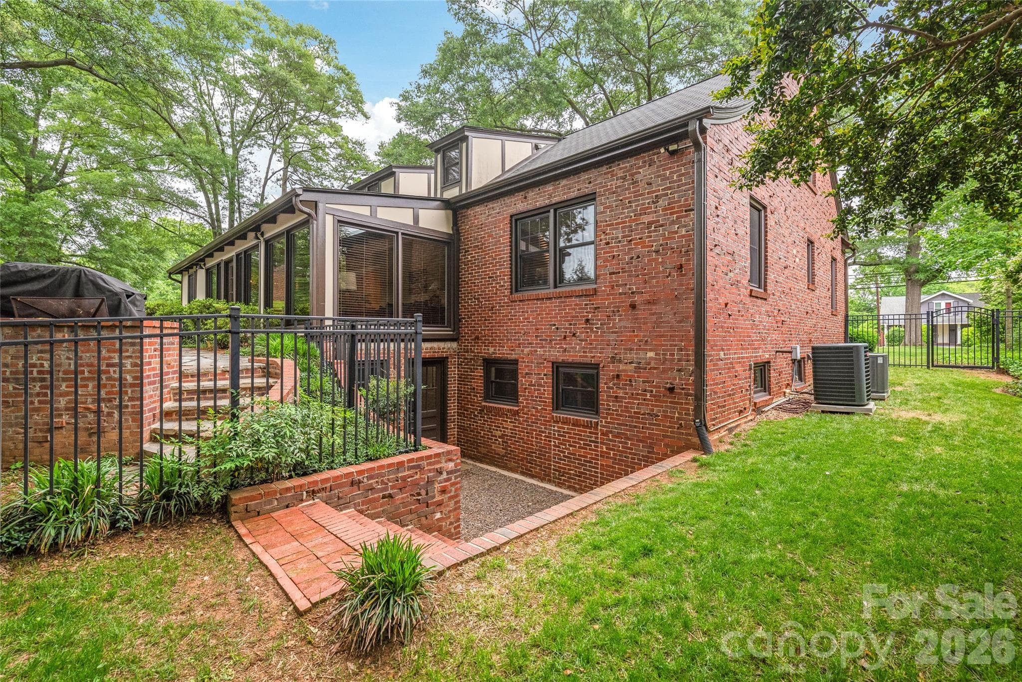 Rear Exterior, spacious home with a basement - 600 S Central Avenue, Belmont