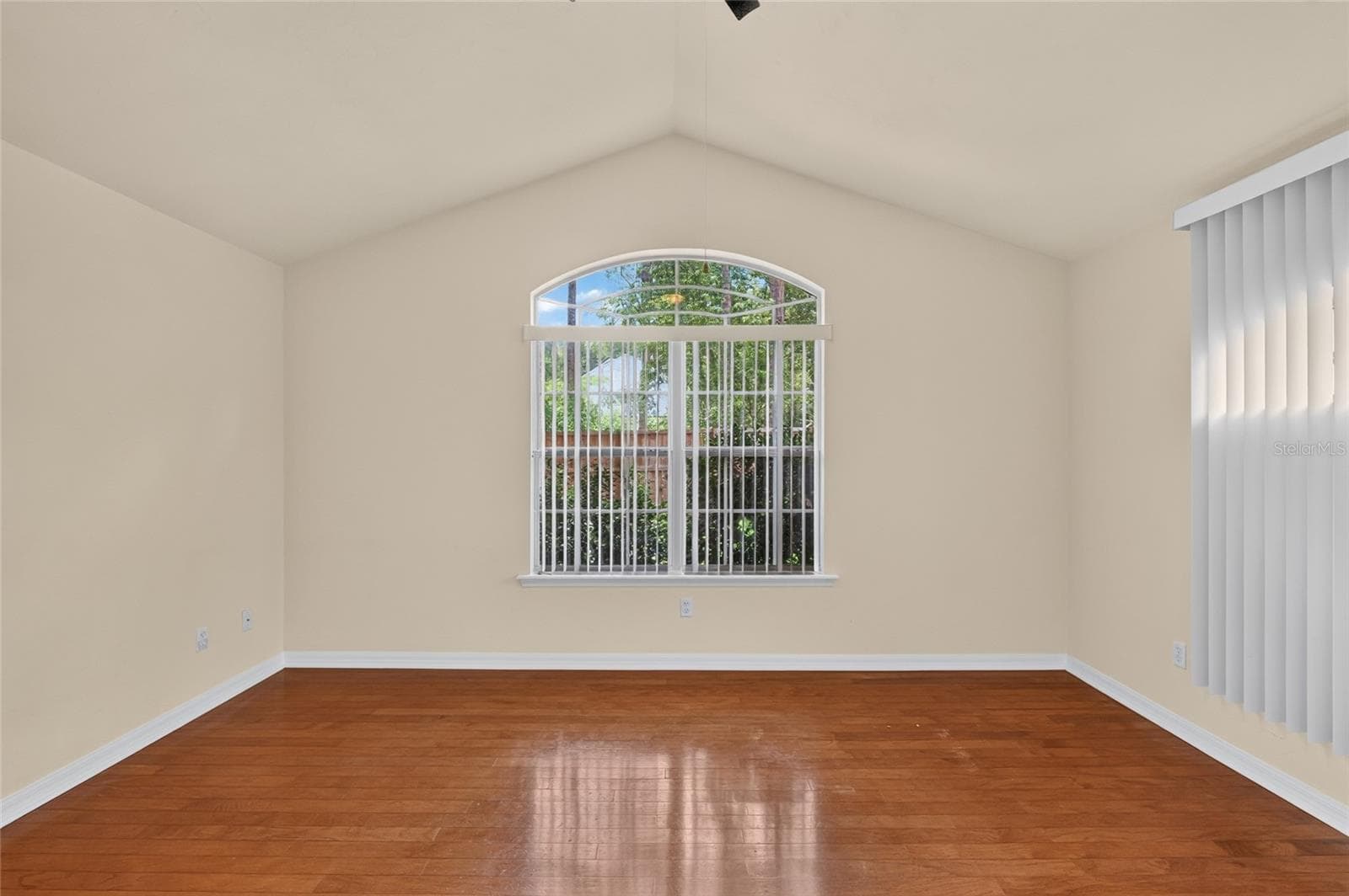 PRIMARY BEDROOM HAS VAULTED CEILINGS - 9437 SW 31ST LN, GAINESVILLE