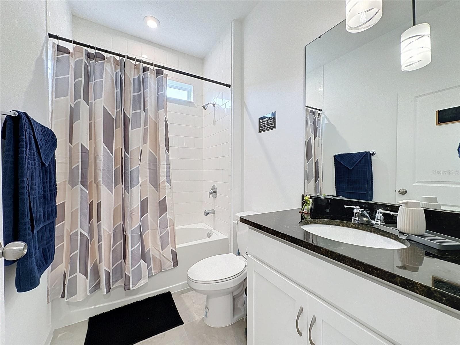 First Floor Bathroom - 900 HONEY PETAL LN, DELAND
