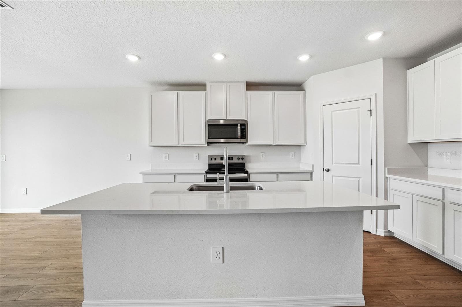 Single Family Residence at 13684 UMBER FOREST ST, HUDSON, photo 14 of 47