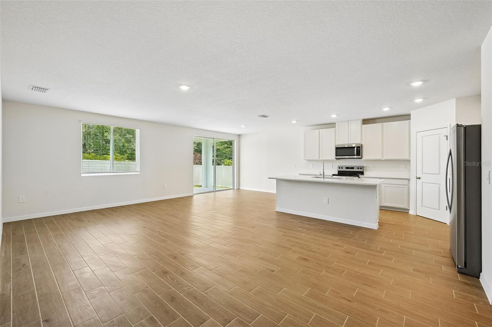 Single Family Residence at 13755 UMBER FOREST ST, HUDSON, photo 5 of 50