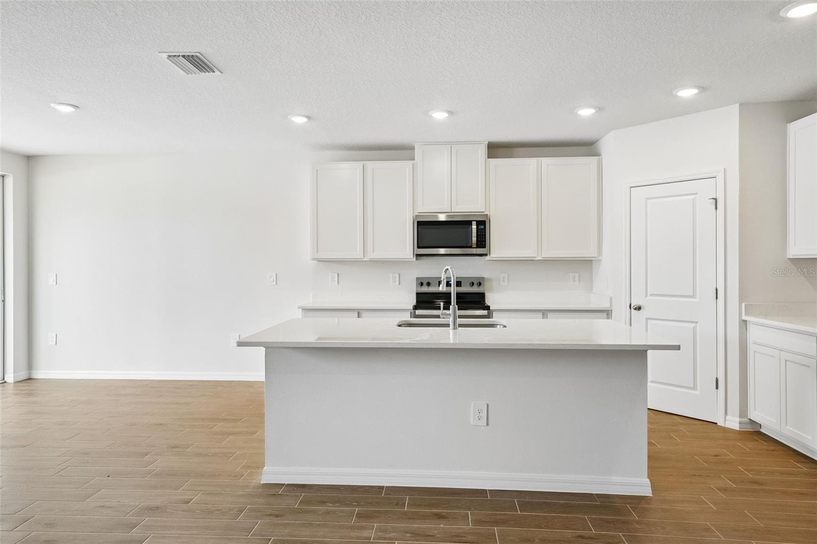 Single Family Residence at 13755 UMBER FOREST ST, HUDSON, photo 9 of 50