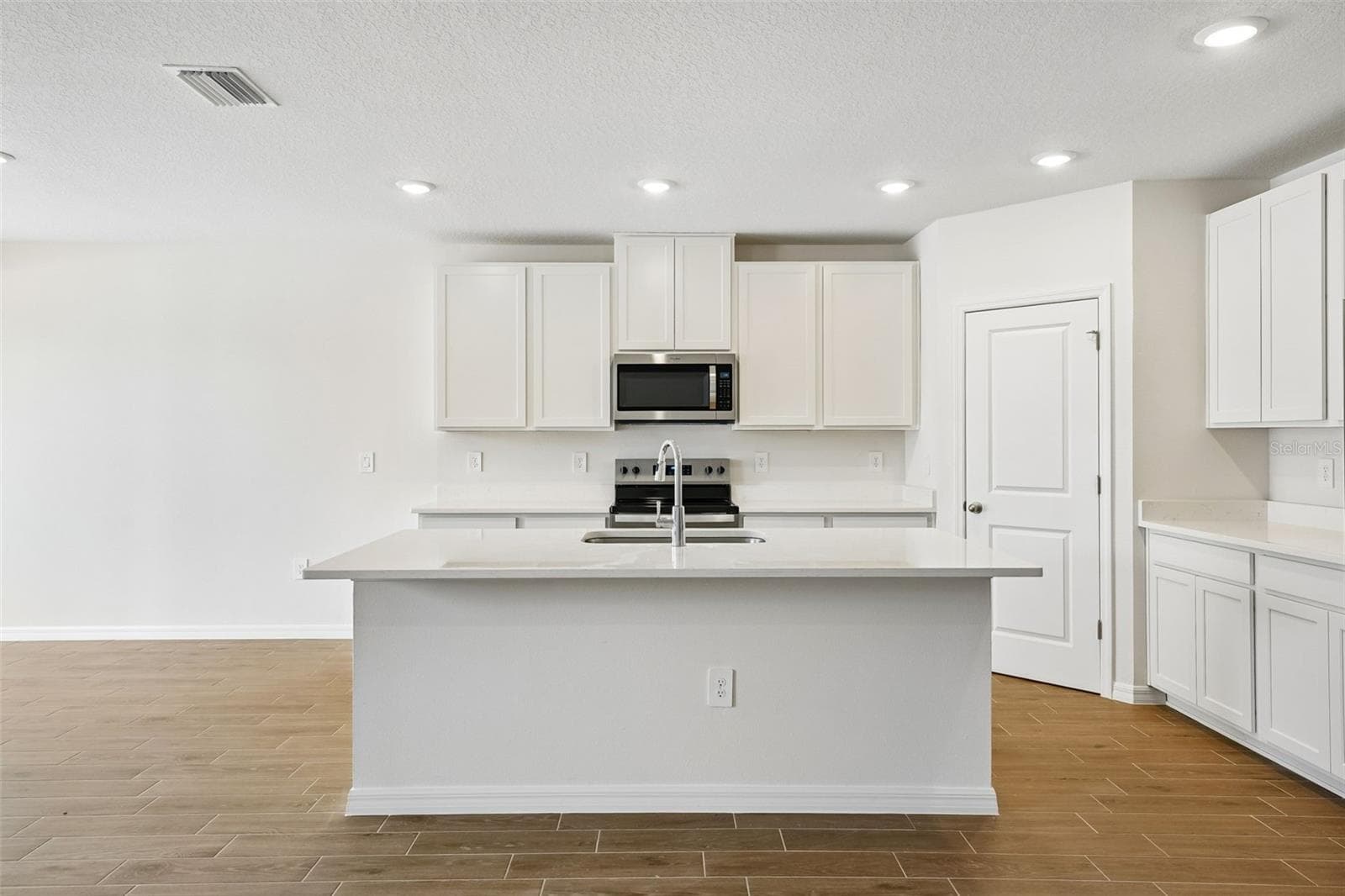 Single Family Residence at 13755 UMBER FOREST ST, HUDSON, photo 10 of 50