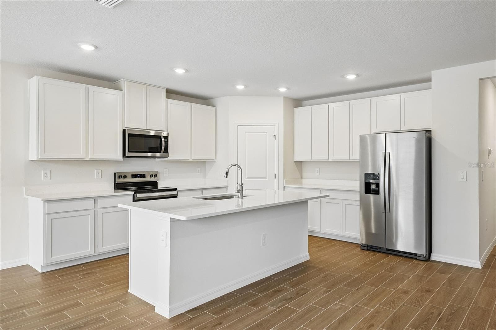Single Family Residence at 13755 UMBER FOREST ST, HUDSON, photo 11 of 50