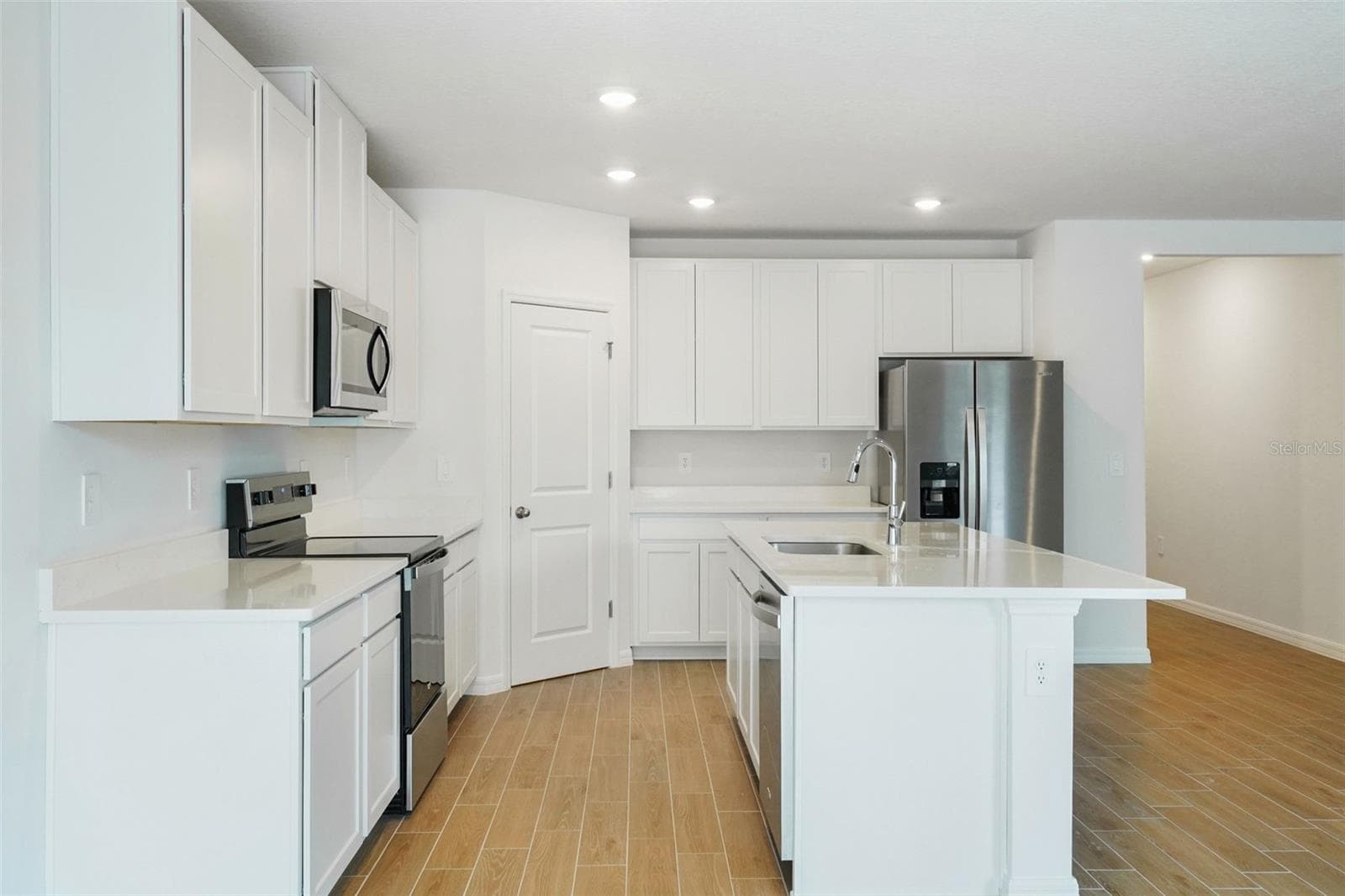 Single Family Residence at 13755 UMBER FOREST ST, HUDSON, photo 13 of 50