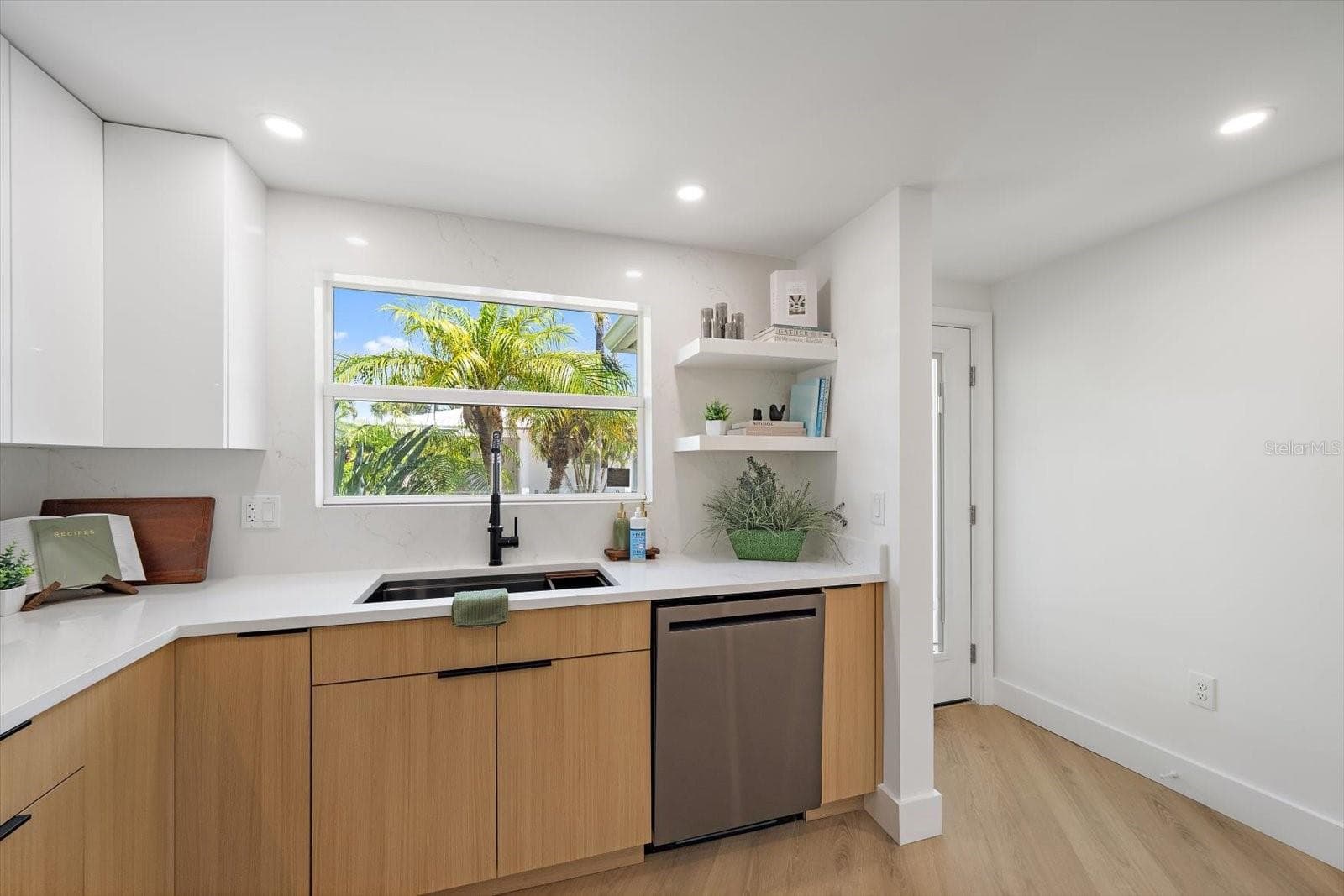 Kitchen with new fixtures throughout and farmhouse sink - 578 SPANISH DR S, LONGBOAT KEY
