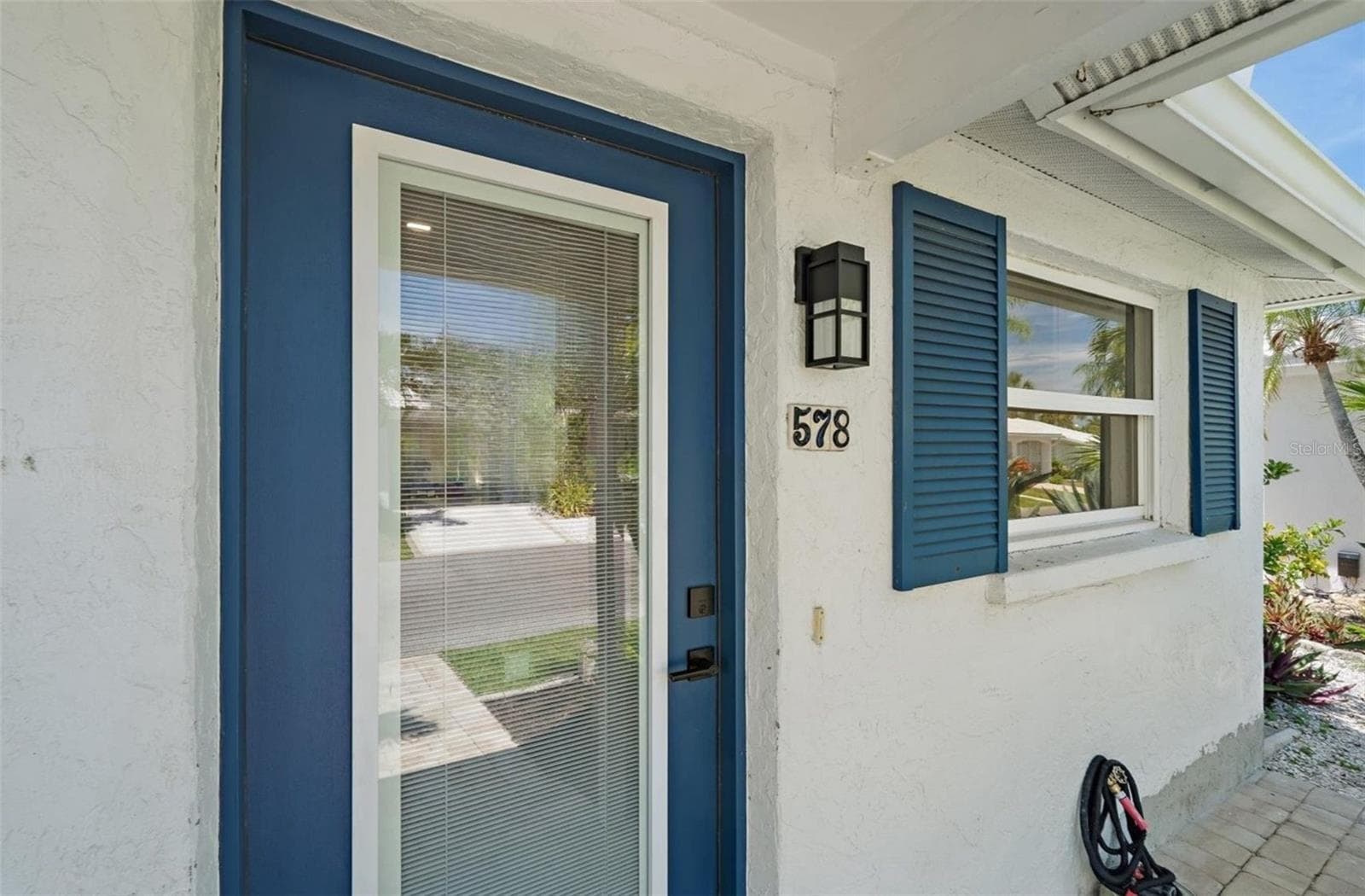 Hurricane impact front door to the house - 578 SPANISH DR S, LONGBOAT KEY