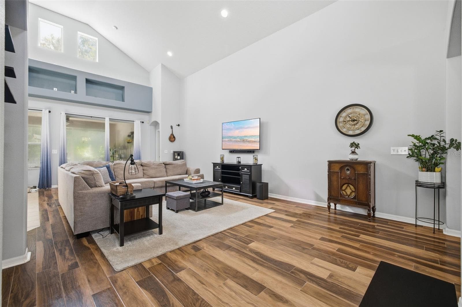 Family room with soaring ceilings - 6846 PINE SPRINGS, WESLEY CHAPEL