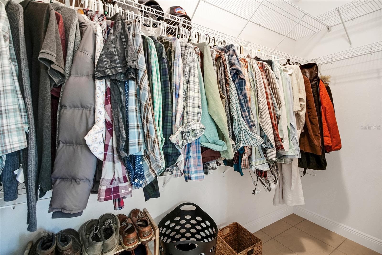 Walk-in closet of primary suite - 10757 COUNTY ROAD 223, OXFORD