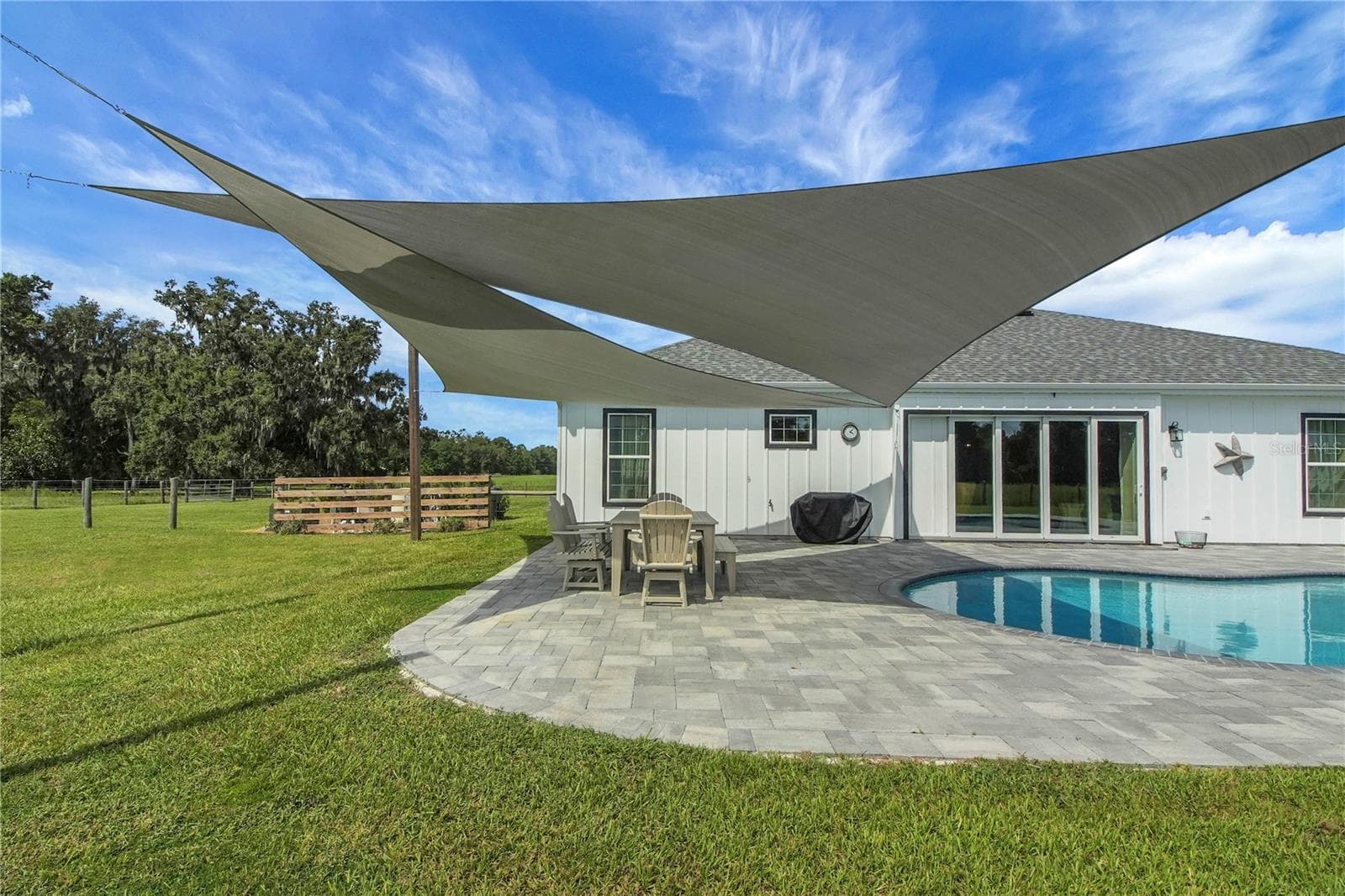 Pool with shade feature - 10757 COUNTY ROAD 223, OXFORD