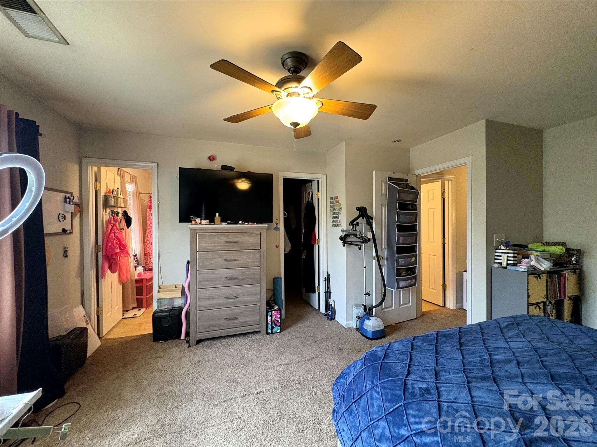 Primary bedroom with primary bathroom and walk in closet - 11637 Coddington Ridge Drive, Charlotte