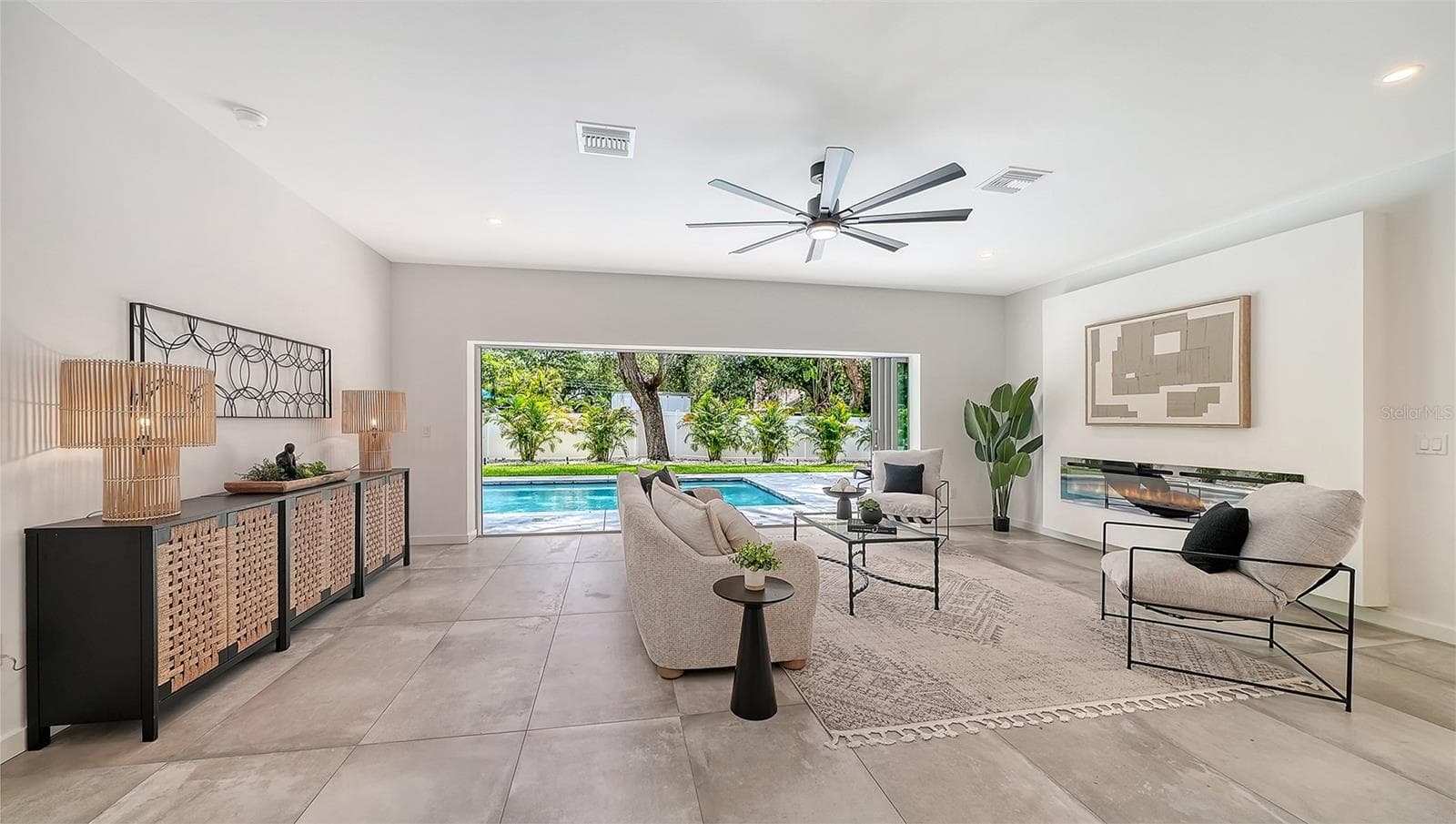 Open living area with pool views. - 2050 EUCLID TER, SARASOTA