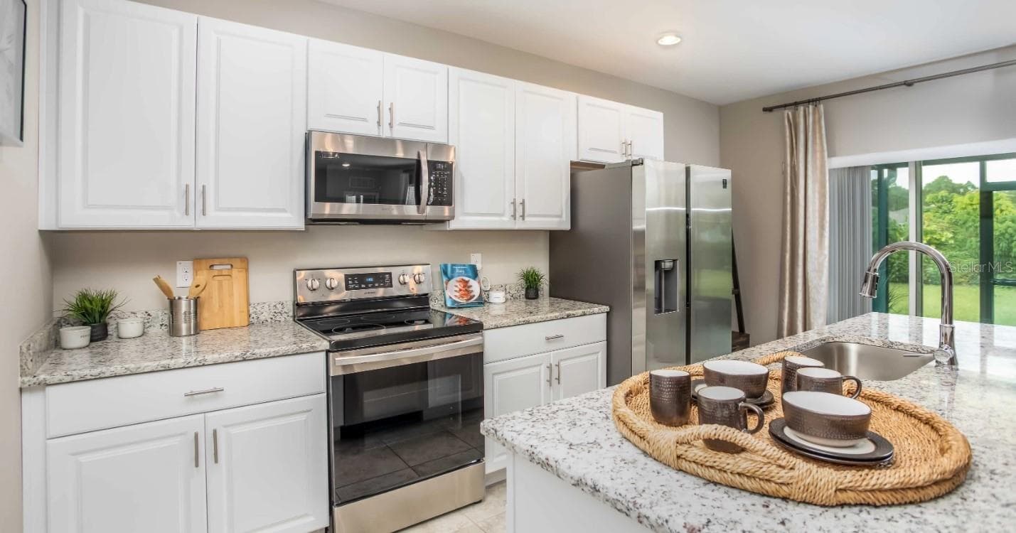Model home - actual features may vary. - 1475 TRINIDAD ST, DELAND