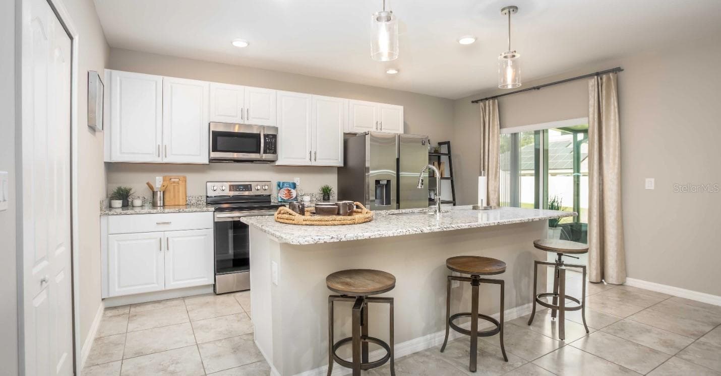 Model home - actual features may vary. - 1475 TRINIDAD ST, DELAND