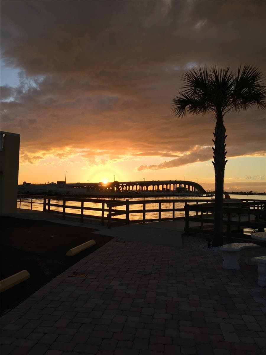 Sunset view of Belleair Bridge (actual) - 100 BLUFF VIEW DR #211C, BELLEAIR BLUFFS