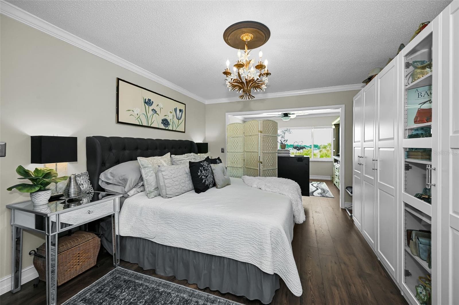 Primary bedroom with custom light - 100 BLUFF VIEW DR #211C, BELLEAIR BLUFFS