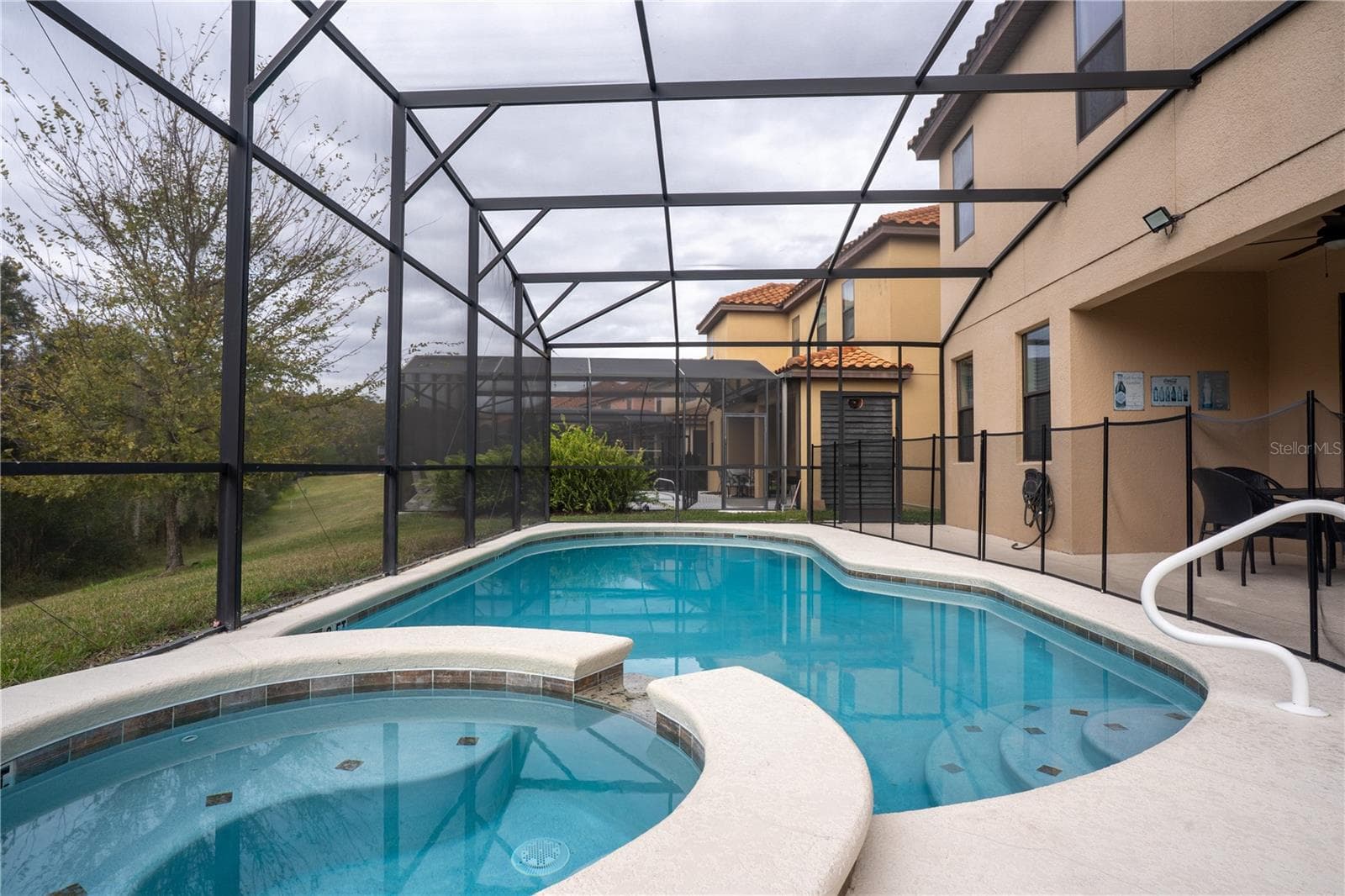 pool with conservation view - 2610 TRANQUILITY WAY, KISSIMMEE