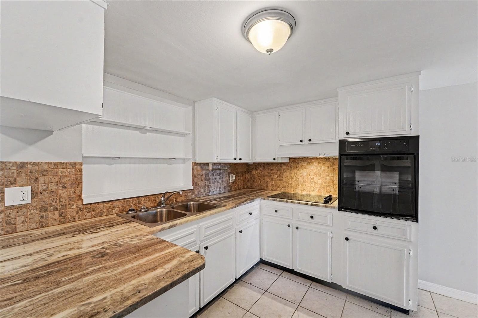 Single Family Residence at 7520 CAMELOT RD, PORT RICHEY, photo 5 of 15