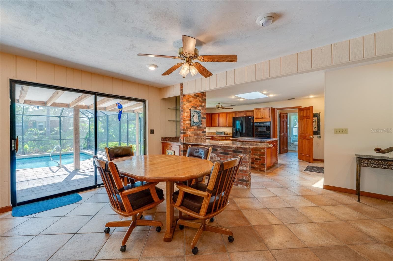 Breakfast area and kitchen - 697 JOHN ANDERSON DR, ORMOND BEACH