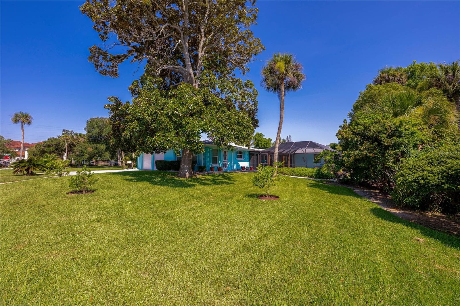 Side and rear lawn - 697 JOHN ANDERSON DR, ORMOND BEACH