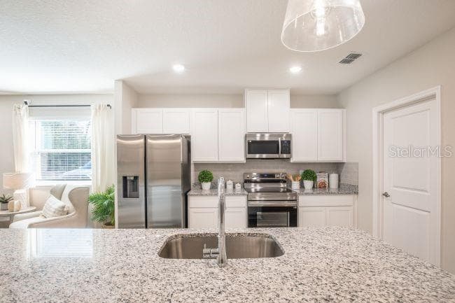 Model home - actual features may vary. - 31400 MALBEC DR, BROOKSVILLE