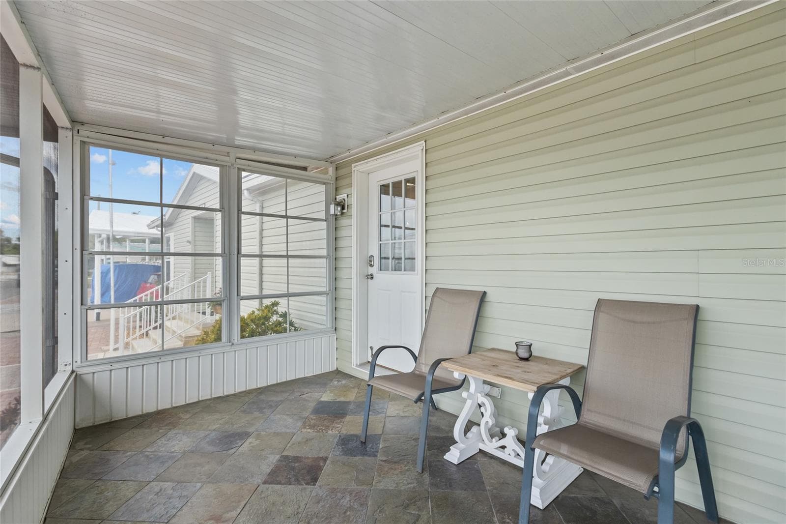 FRONT PORCH SCREENED IN LANAI SPACE - 1710 INDIANA AVE, BRADENTON