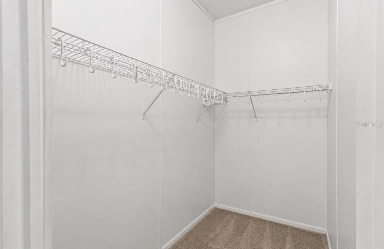 PRIMARY BEDROOM WALK IN CLOSET #1 - 1710 INDIANA AVE, BRADENTON