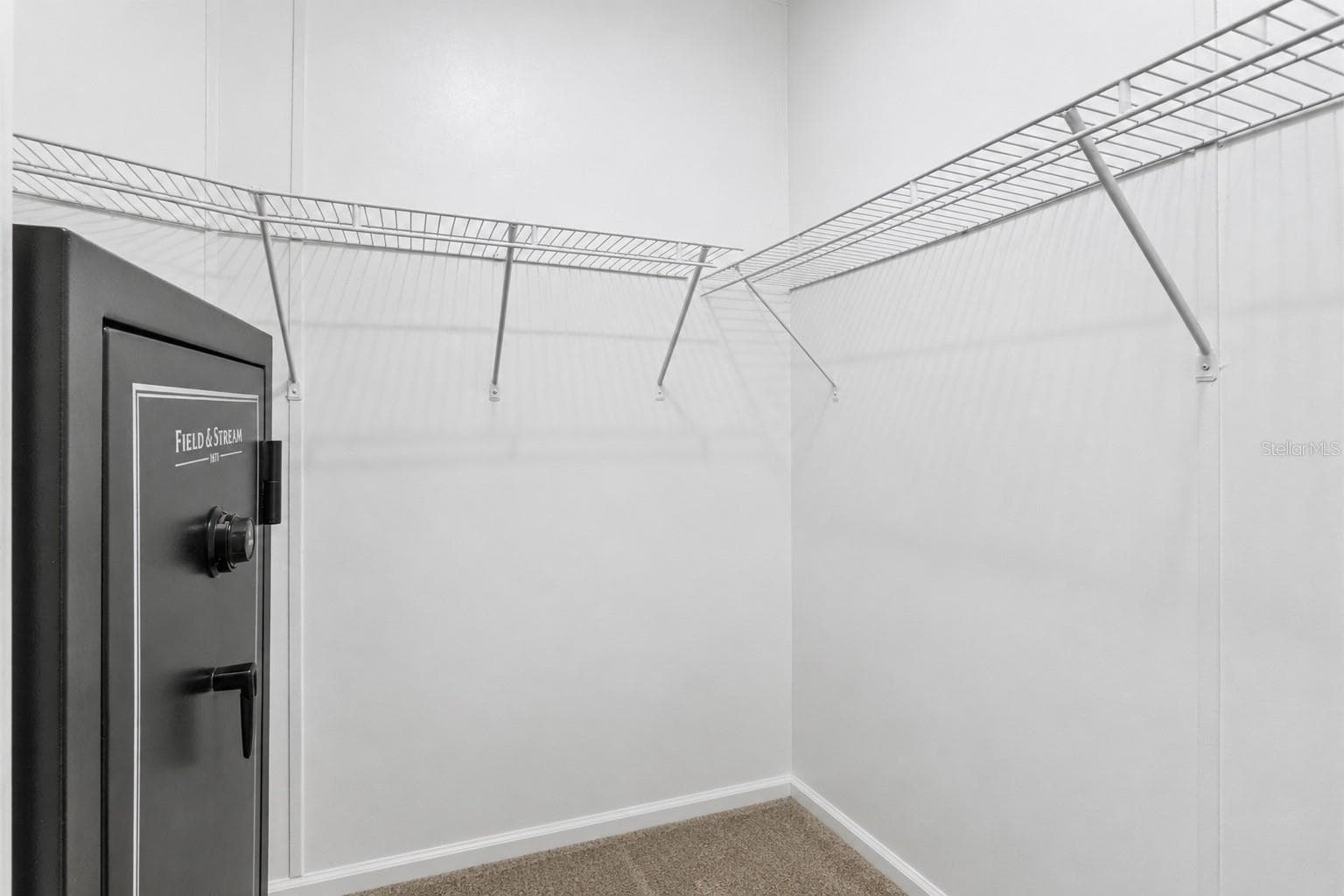 PRIMARY BEDROOM WALK IN CLOSET #2-Safe conveys with home sale. - 1710 INDIANA AVE, BRADENTON