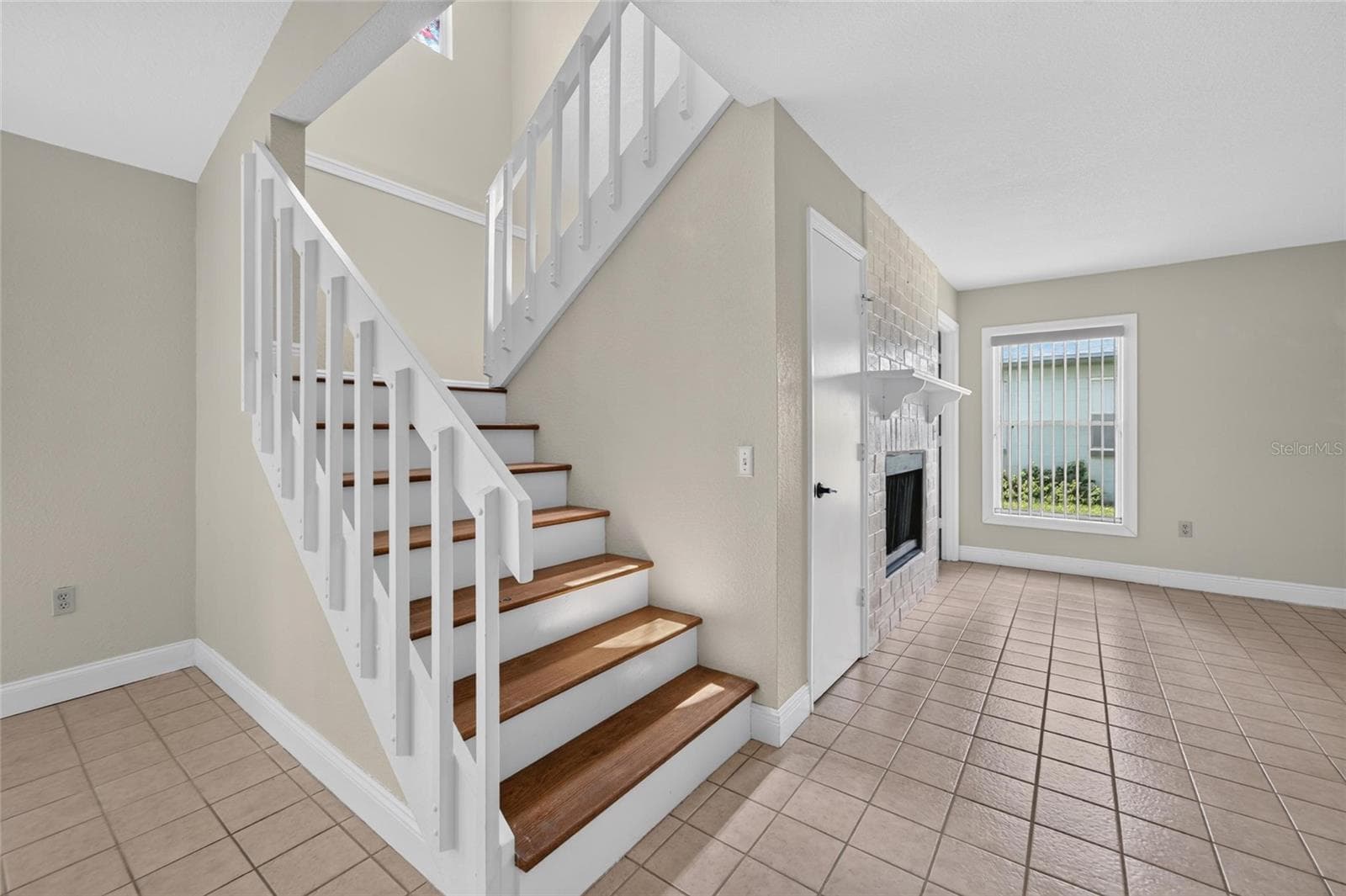 Stairs leading to 2 upstairs bedrooms & 1 bath - 5309 ST LUCIA DR, LAKELAND
