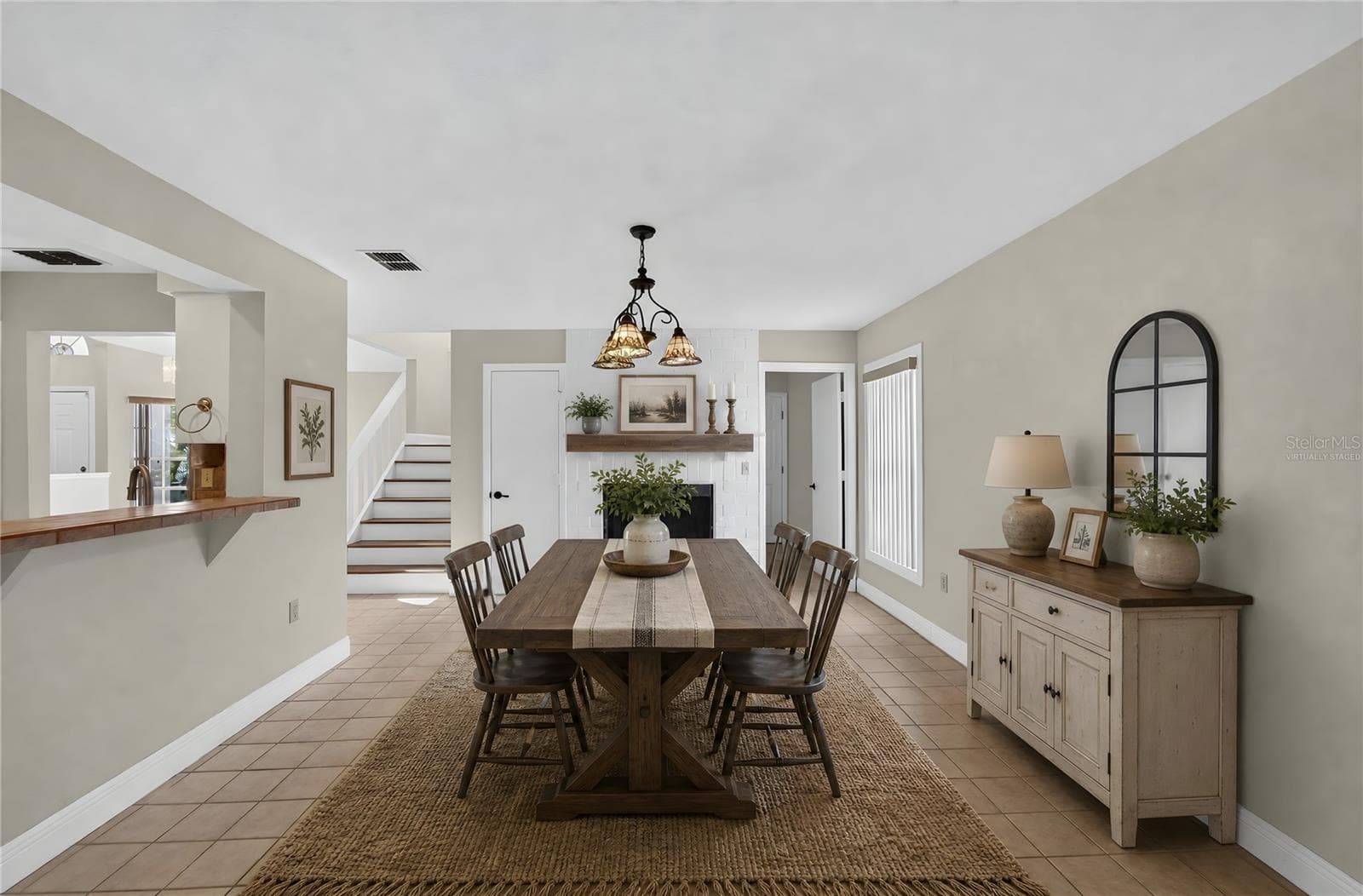Virtually Staged 2nd Dining Room/Dinette with Fireplace - 5309 ST LUCIA DR, LAKELAND