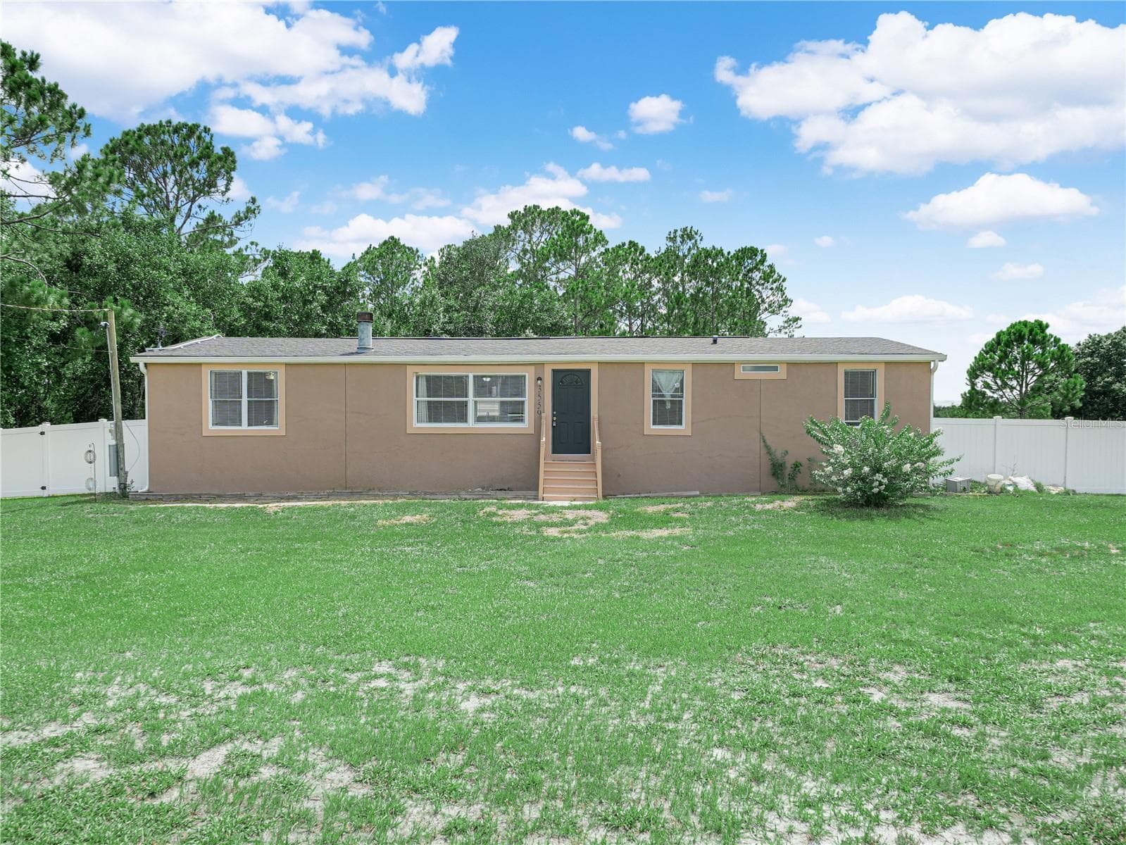 Manufactured Home at 3559 REAGAN BLVD, LAKE WALES, photo 2 of 45
