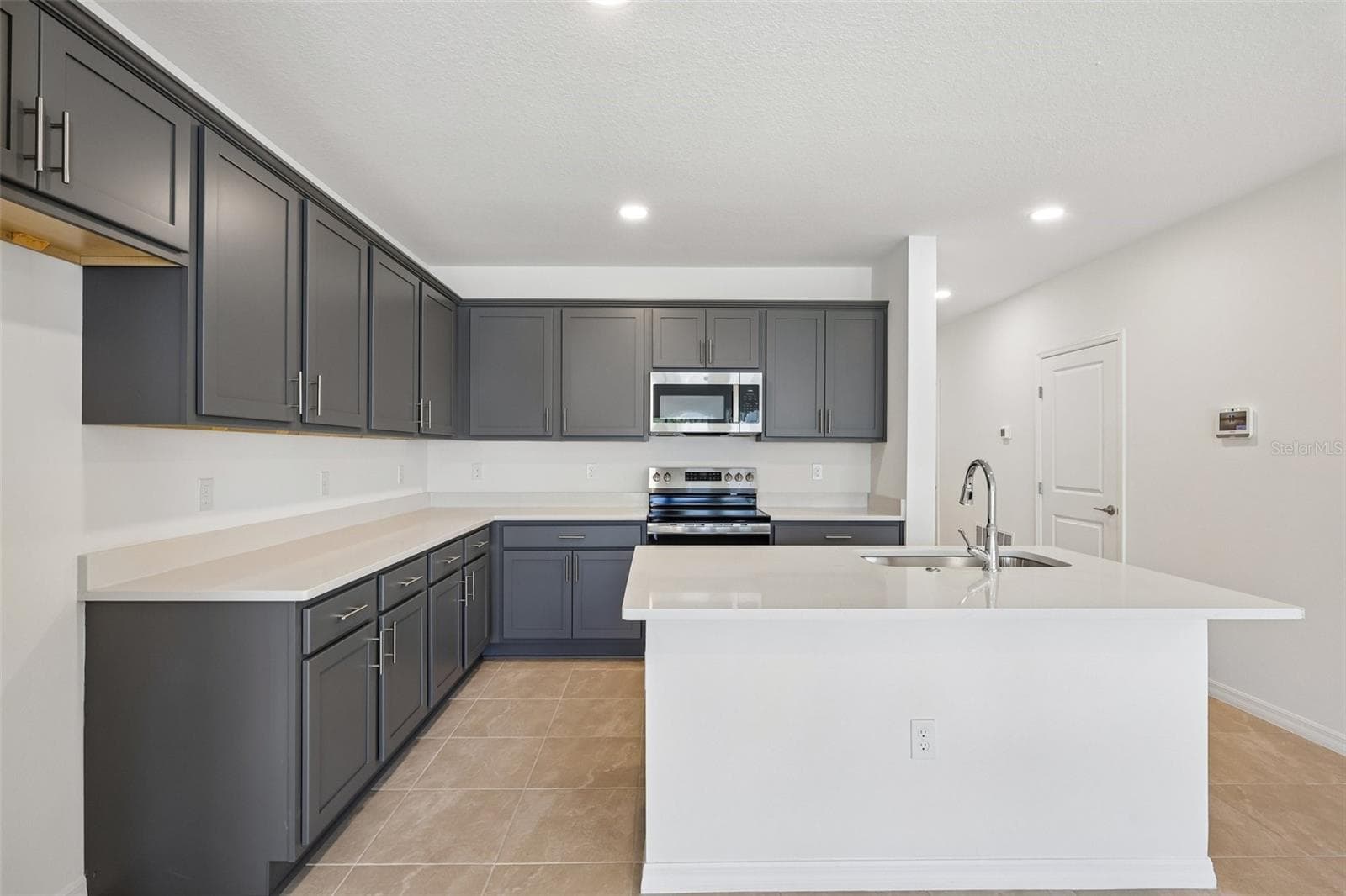 Townhouse at 34559 TURPINS AVE, ZEPHYRHILLS, photo 9 of 30