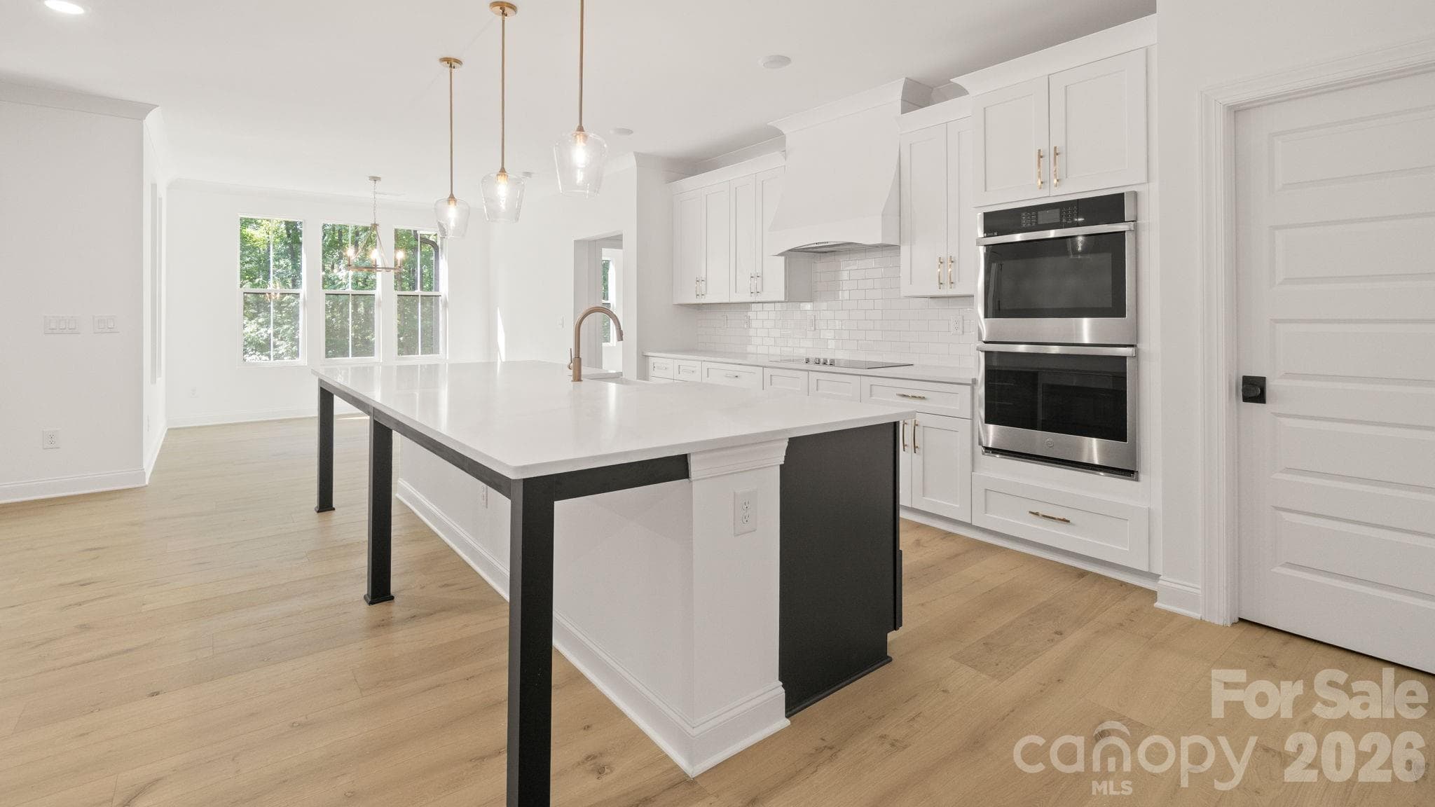 Kitchen to Dining - 6774 Kingfisher Court, Denver