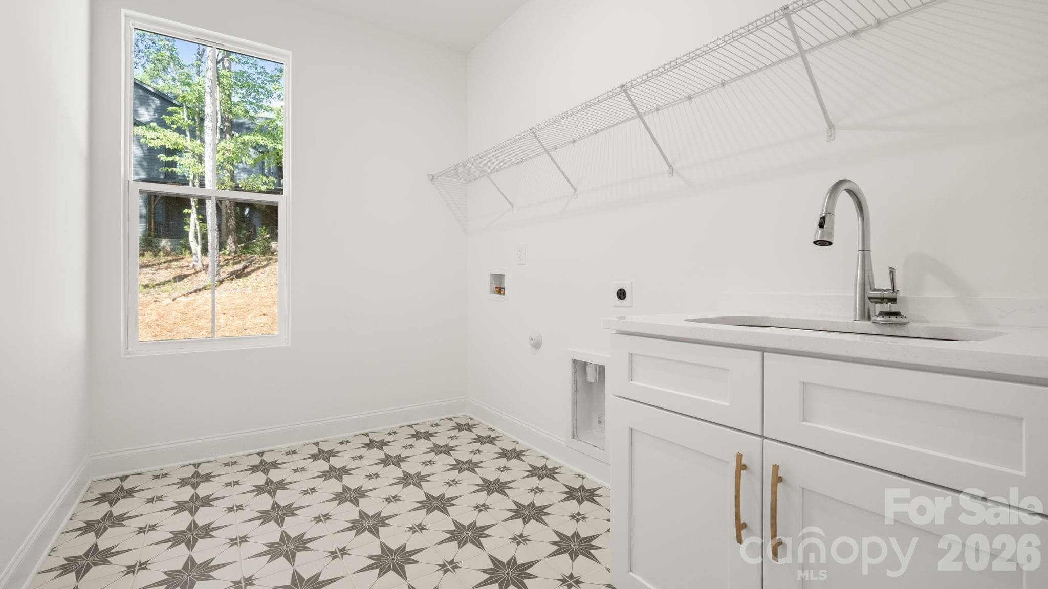 Main Level Laundry Room - 6774 Kingfisher Court, Denver