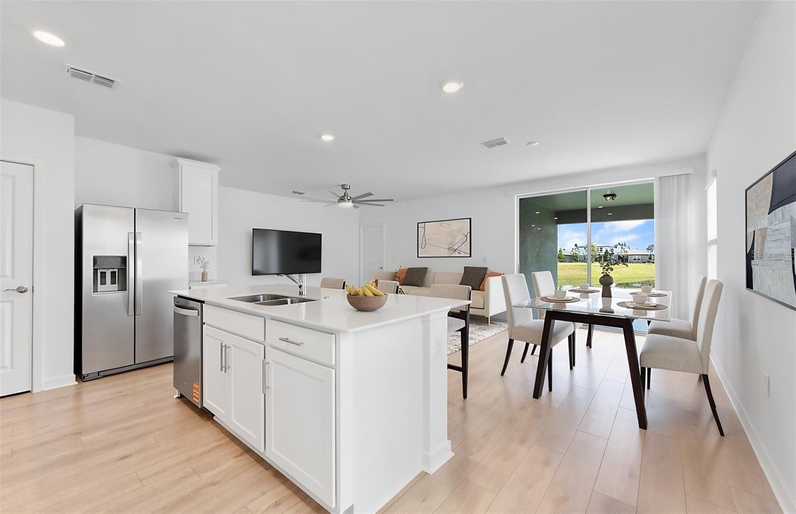 Virtually Staged - Open Kitchen to Cafe to Gathering Room - 3033 WINDSWEPT WAY, WILDWOOD