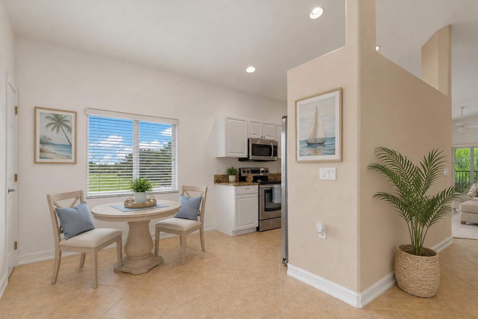 Virtual Staged View from entry, breakfast nook - 7196 N PLUM TREE #321, PUNTA GORDA