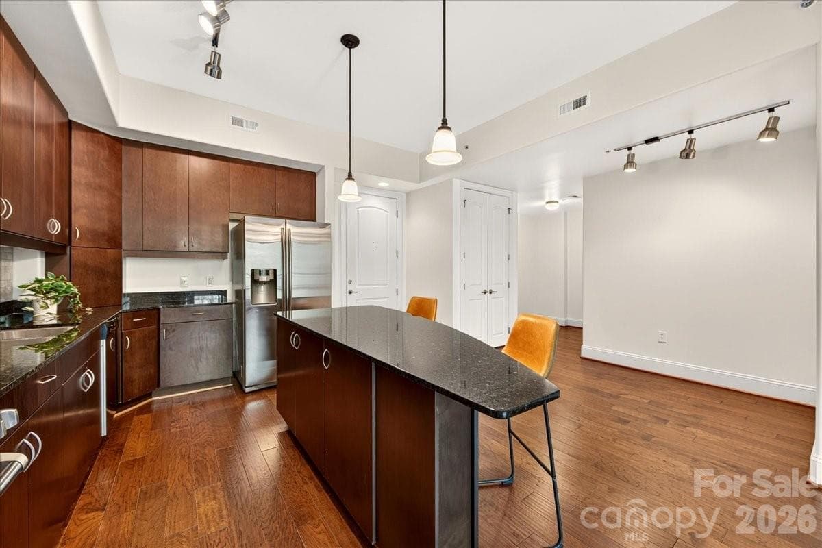 The large island is great for entertaining and additional seating - Charlotte