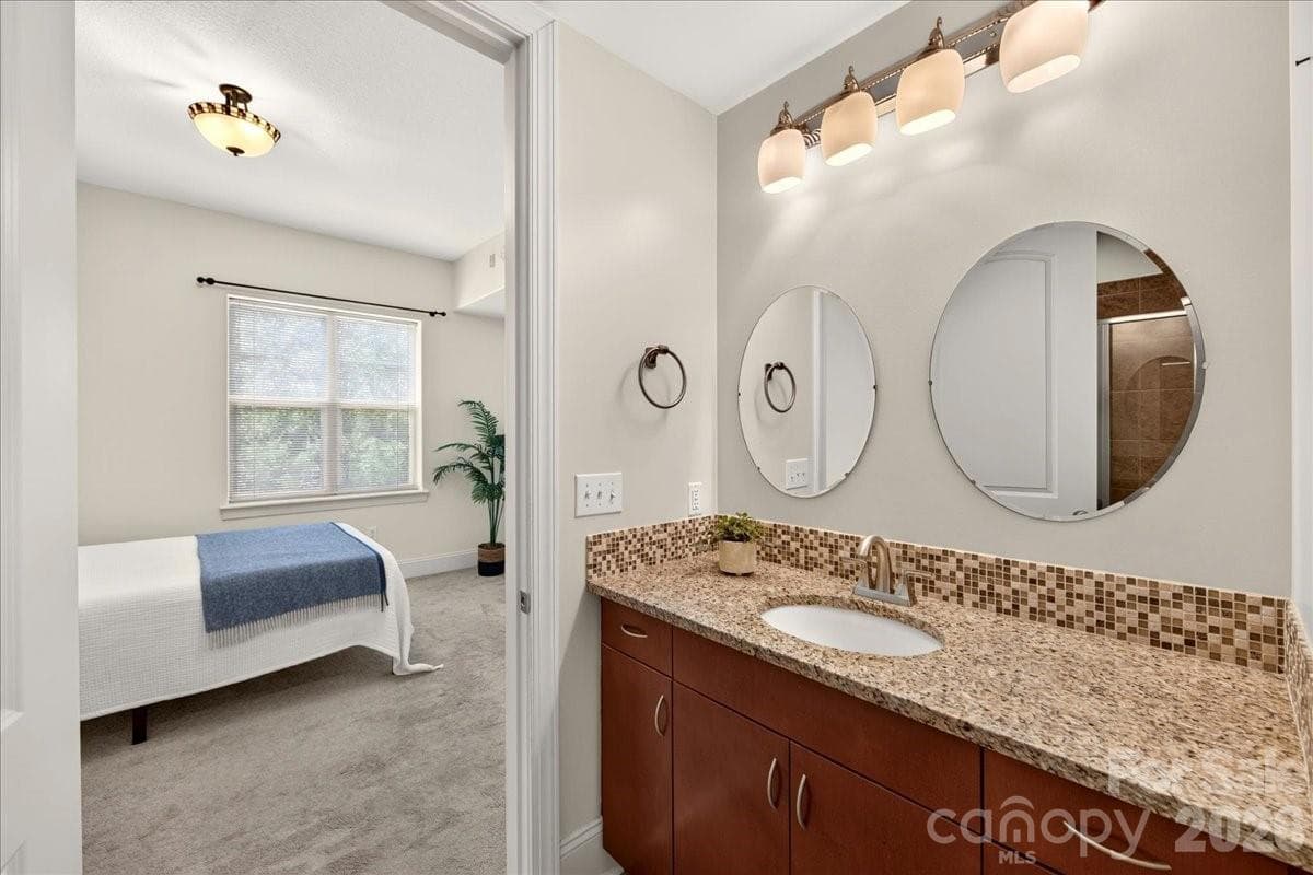 Ensuite bathroom with granite countertop - Charlotte