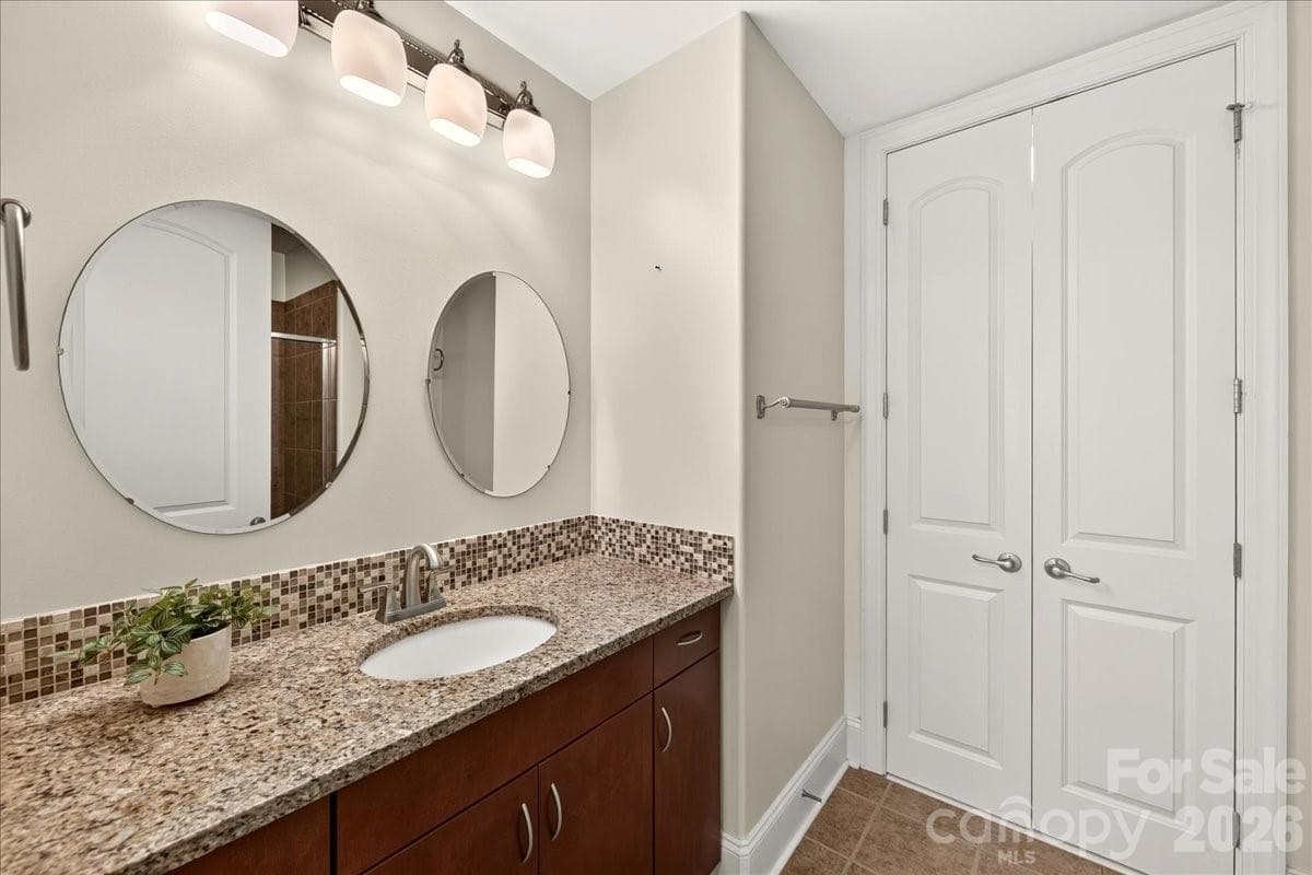 Vanity with doors to the walk-in closet - Charlotte